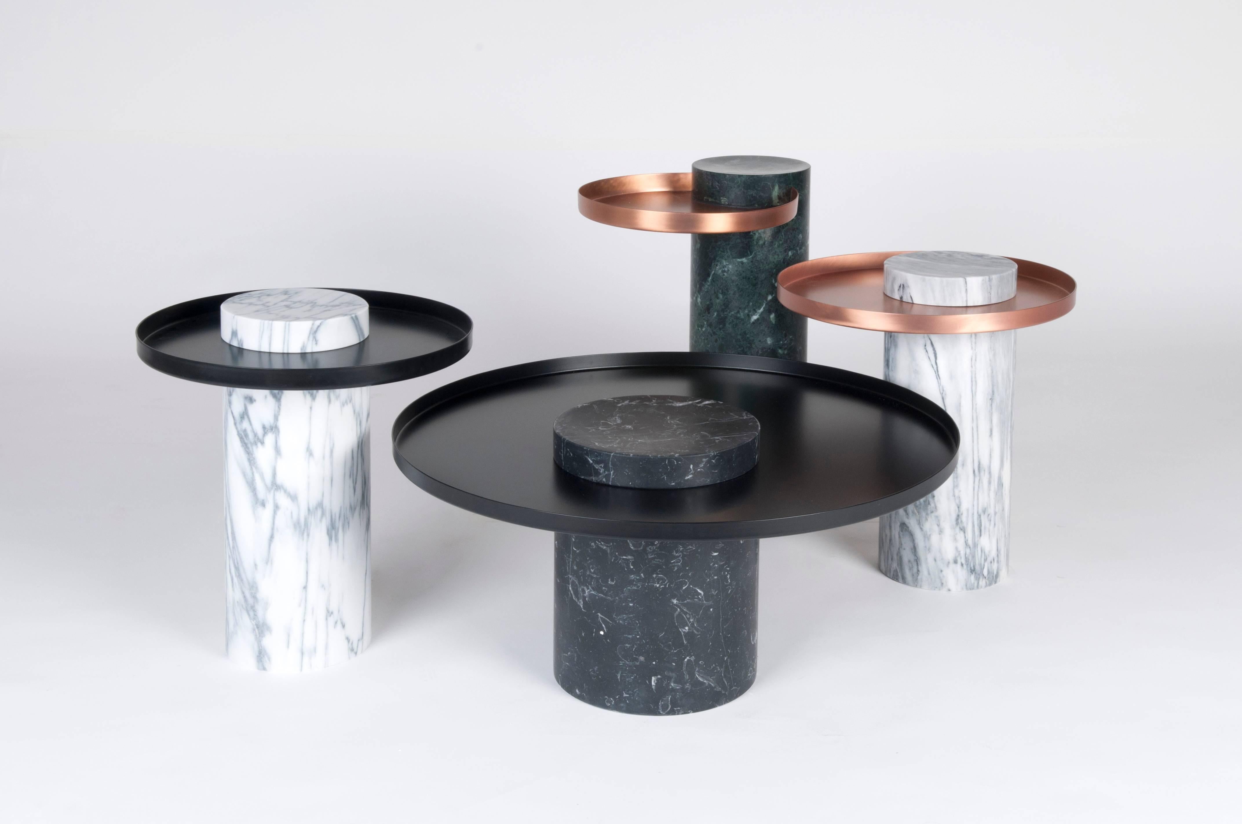 Low indian green marble contemporary guéridon, Sebastian Herkner.
Dimensions: D 70 x H 33 cm.
Materials: Indian green marble, copper.

The salute table exists in 3 sizes, 4 different marble stones for the column and 5 different finishes for the