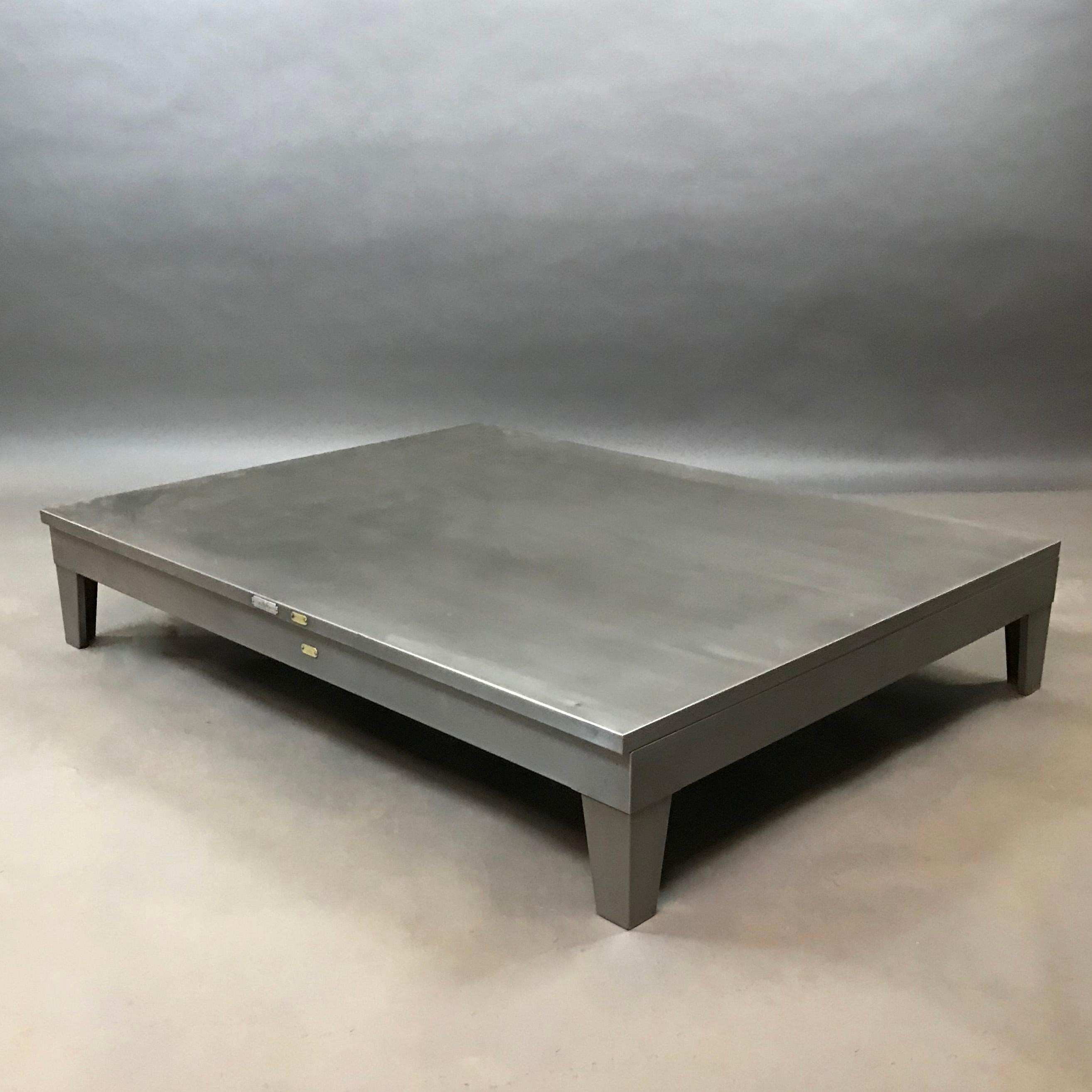 Large, low, midcentury, brushed steel base by Steel Age makes a fantastic industrial coffee table as is or can be built upon.