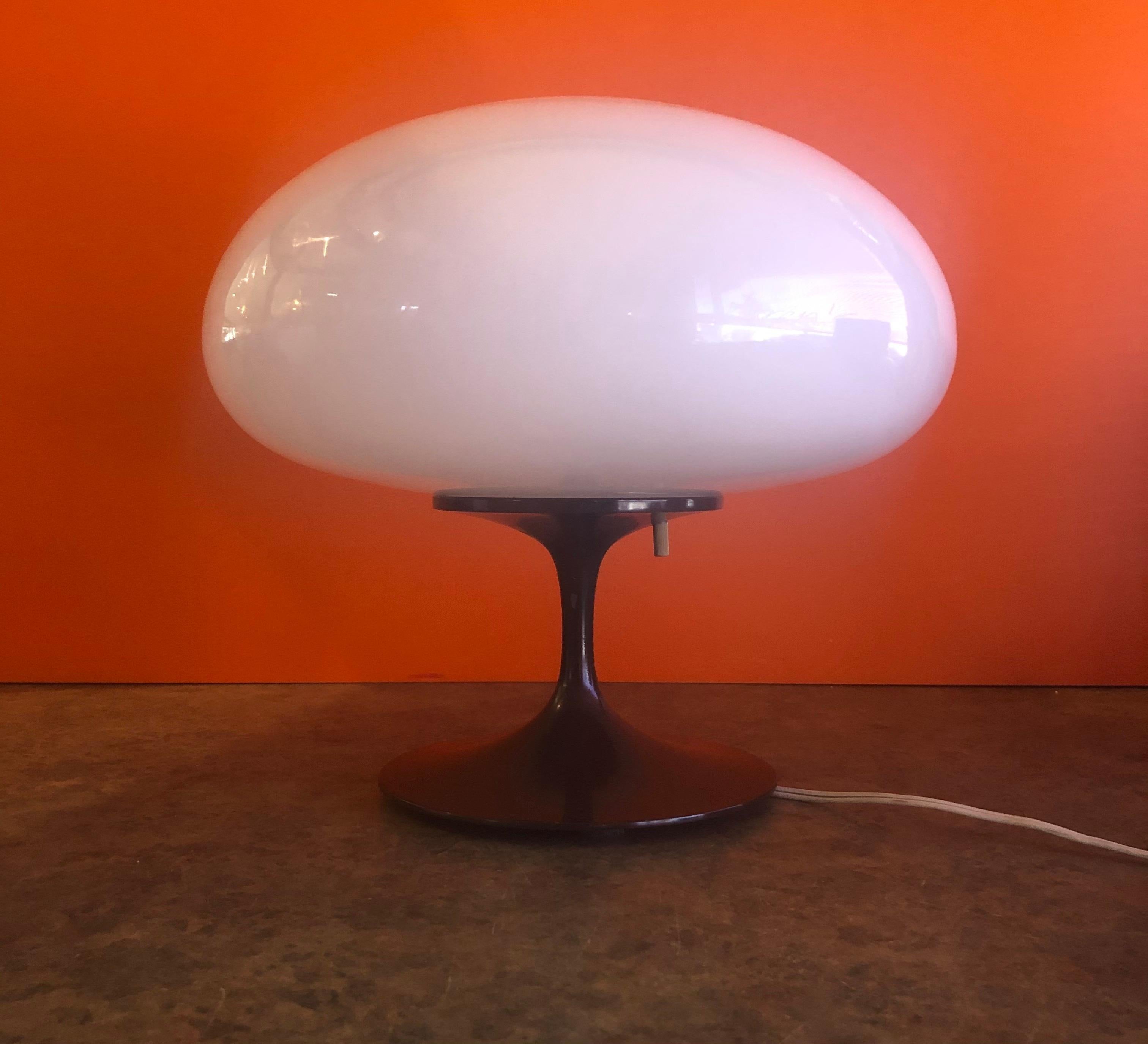Low mushroom lamp with brown base and art glass shade by Laurel Lamp Company, circa 1950s. The base has some chips to the paint (please see pictures) and the shade has a shiny polished finish and is made of blown glass from Italy. Classic MCM piece!