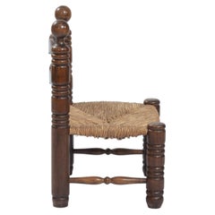 sedia bassa in quercia intrecciata alla maniera di Charles Fr̩chon, anni '40