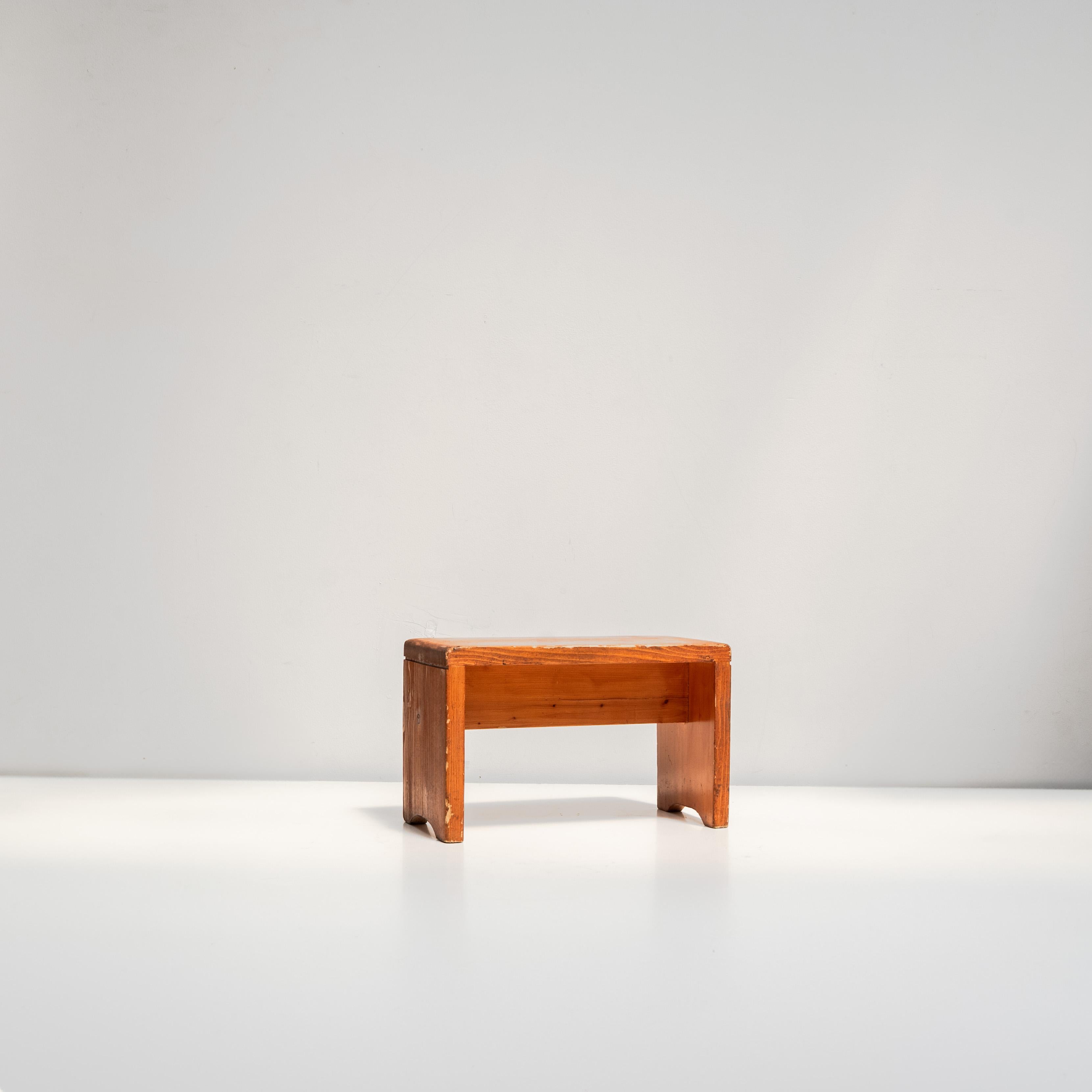 A small pine stool originally produced for the Les Arcs ski resort in the French Alps. With its simple block-like form and natural wood grain, it reflects the rustic yet modern aesthetic that defined the interiors of Les Arcs.

Compact and