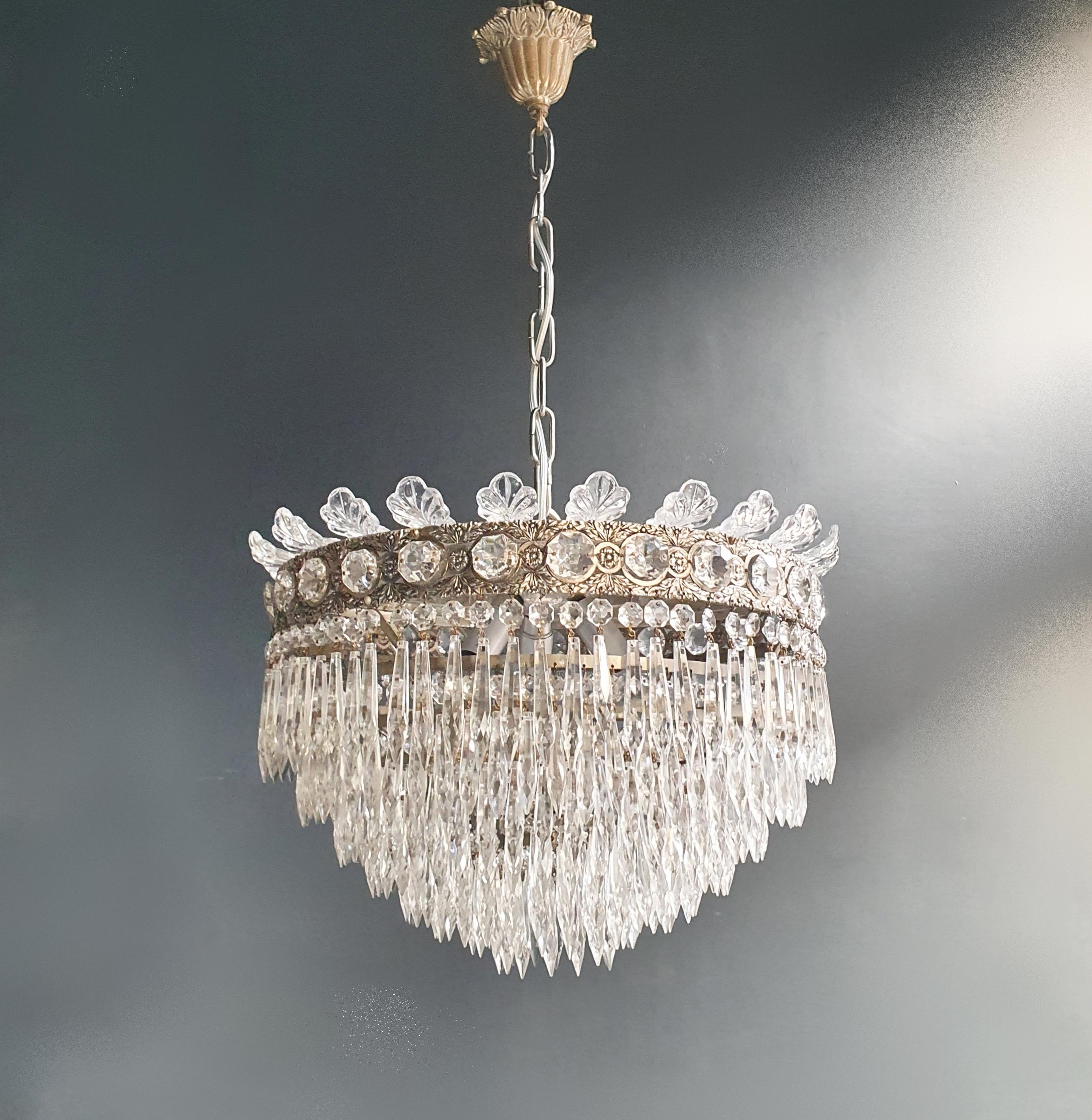 old chandelier with love and professionally restored in Berlin. electrical wiring works in the US.
Re-wired and ready to hang
not one missing
Cabling completely renewed. Crystal, hand-knotted.
Measures: Total height 75 cm, height without chain 33