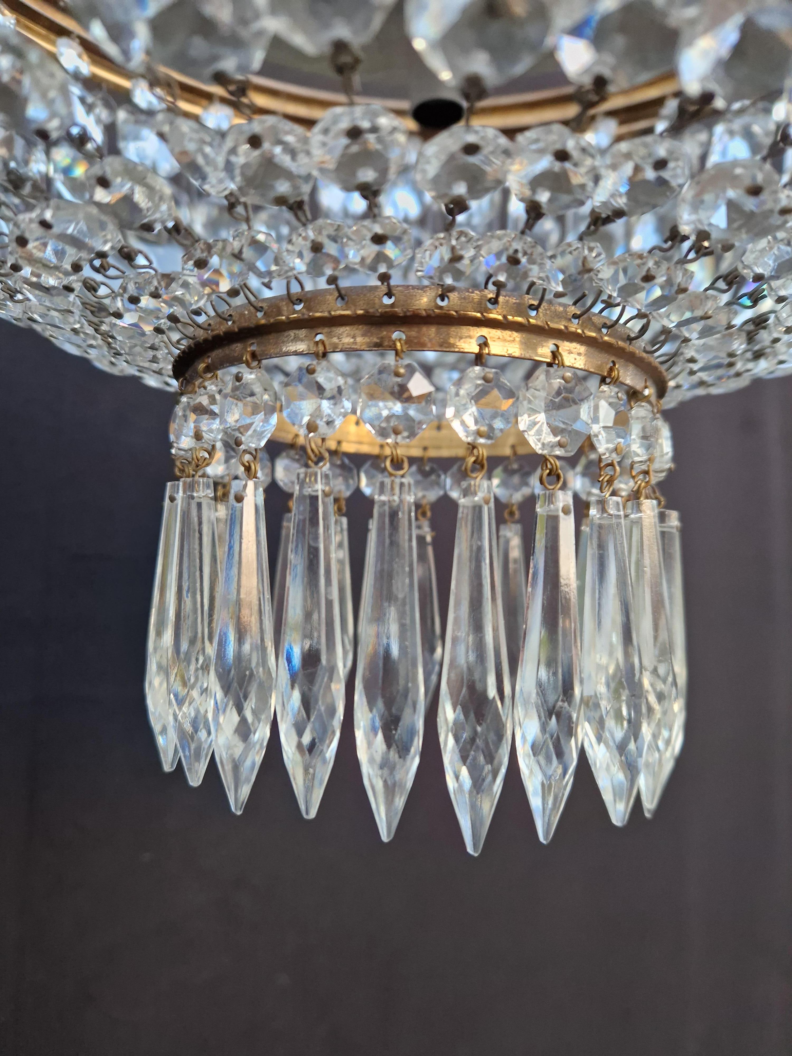 Introducing our beloved old chandelier, tenderly and professionally restored in Berlin. Its electrical wiring is fully compatible with the US, as it has been re-wired and is ready to hang. Not a single crystal is missing, and each one has been
