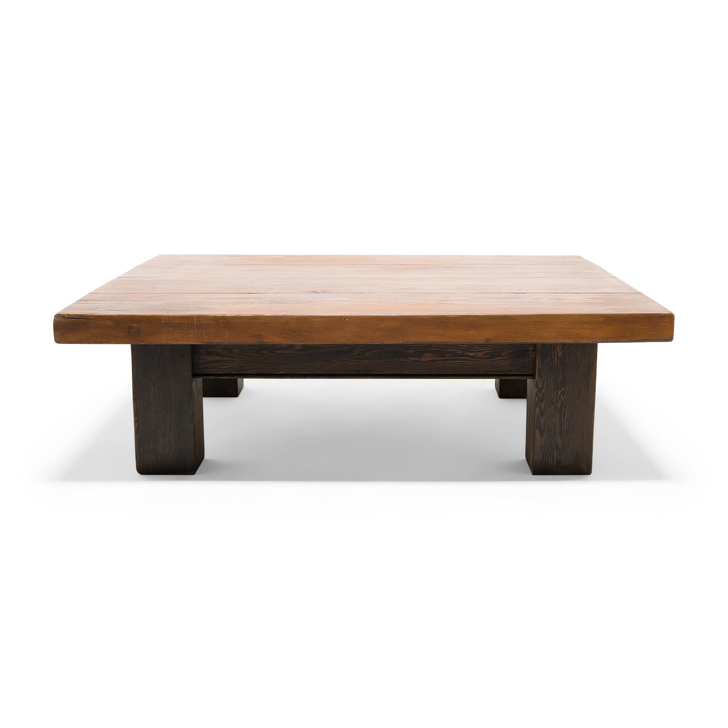 Straightforward and earnest, this example of re-purposed artistry lets the knots, grain, and imperfections of reclaimed distillery wood shine in a low table rich with character. With timeless rustic appeal, the simple design is a sophisticated