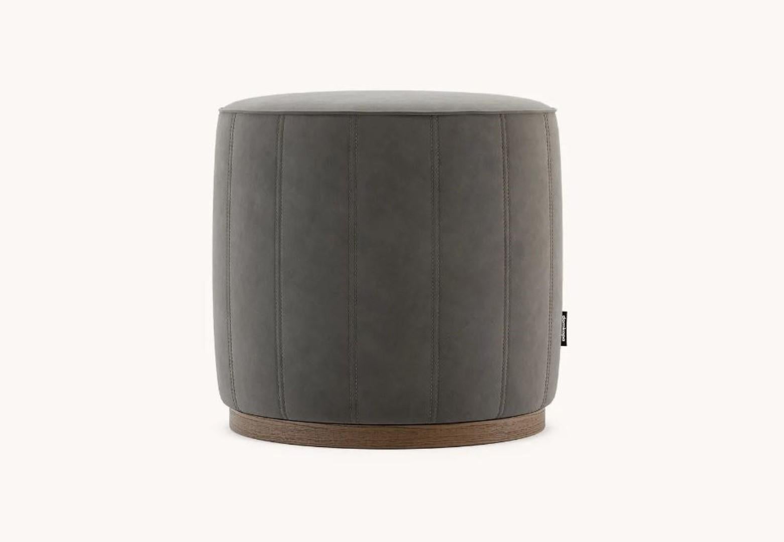Low Pouf by Domkapa
Materials: Natural Leather, Ash, Upholstery. 
Dimensions:  W 47 x D 47 x H 48 cm. 
Also available in different materials. Please contact us.

Low pouf embraces a classic design in its subtle shapes. Its round shape is fully