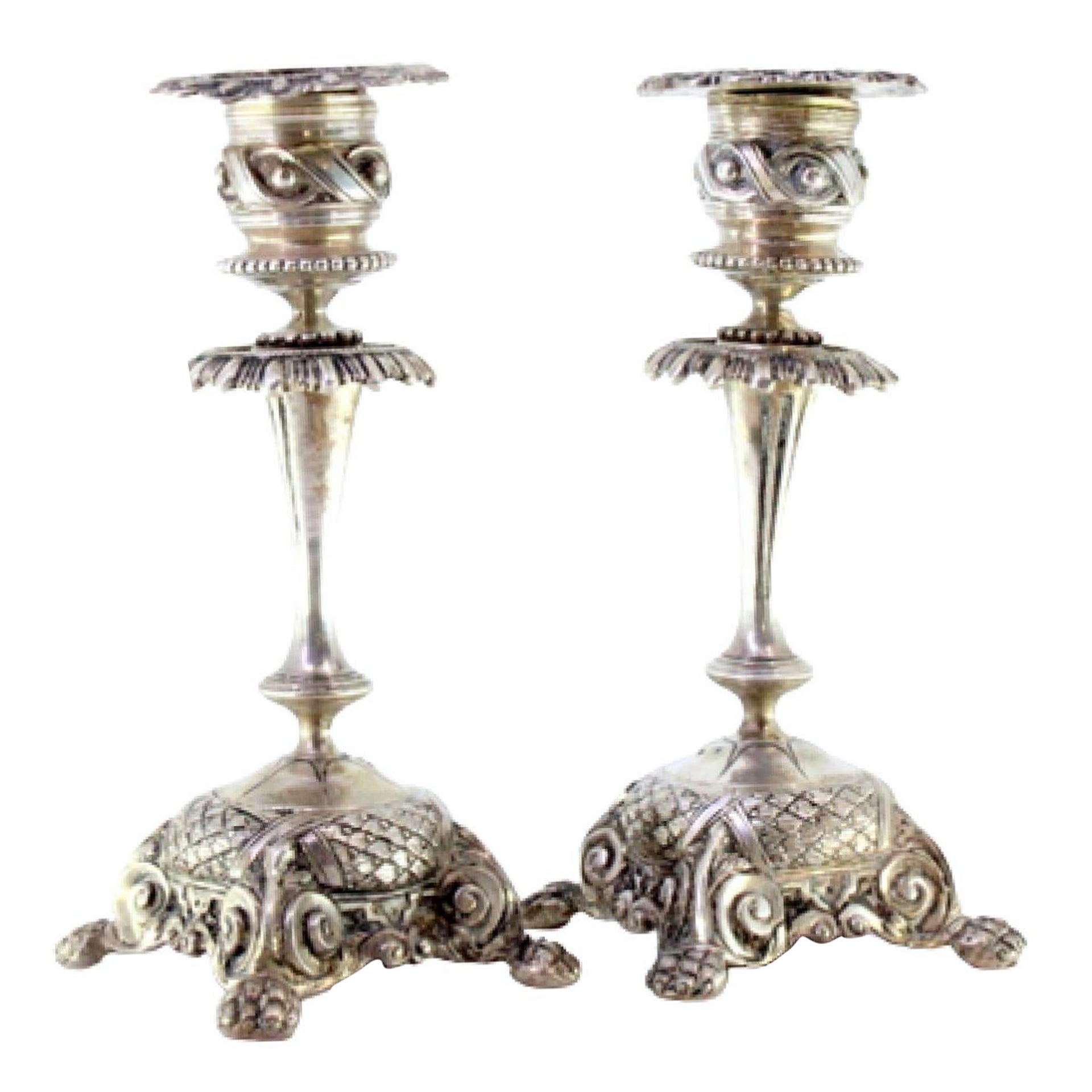Low revealed silver candlesticks with applications on claw feet For Sale