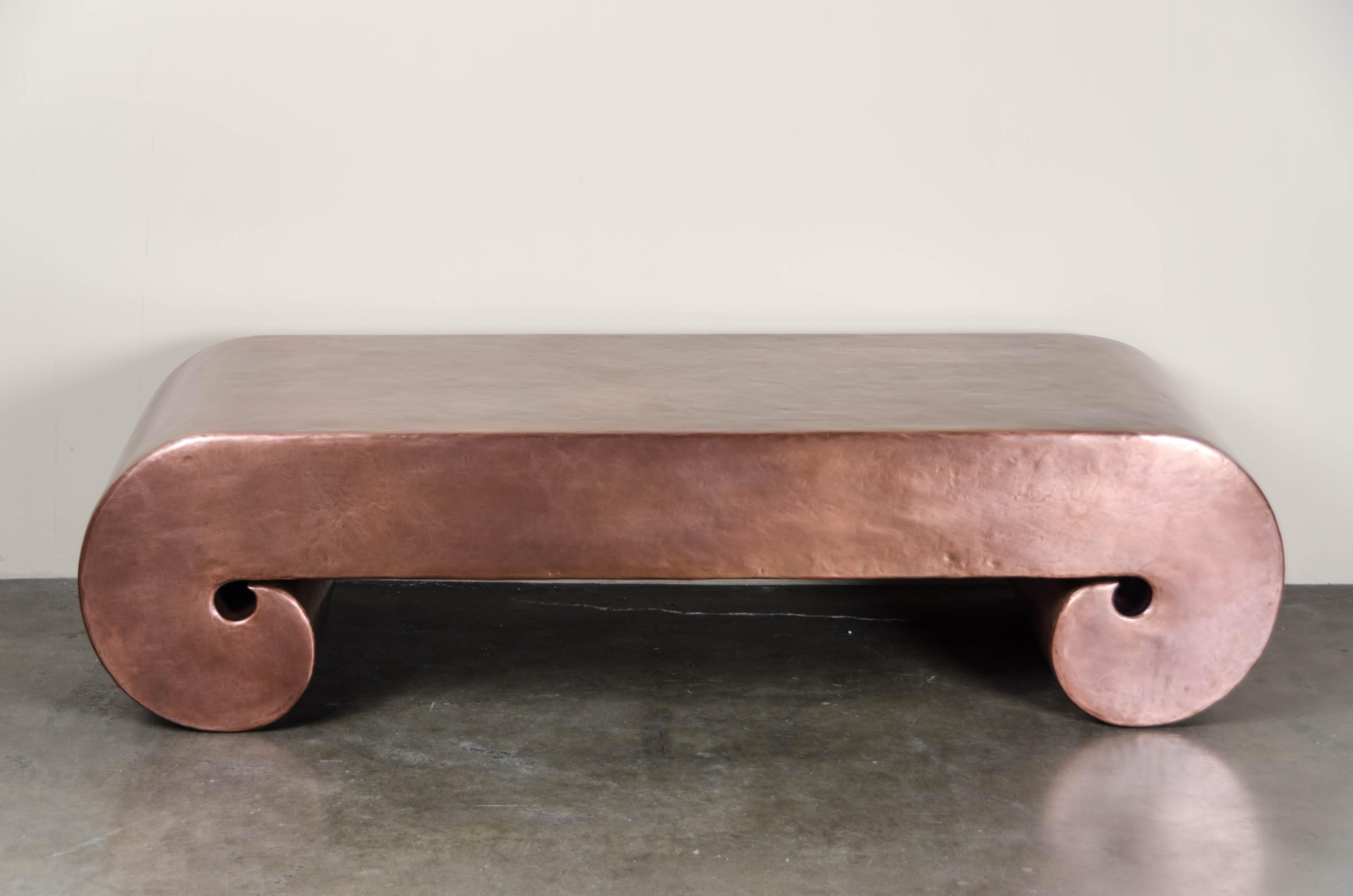 Low scroll design table
Antique copper
Hand repoussé
Wood base
Limited edition

Repousse´ is the traditional art of hand-hammering decorative relief onto sheet metal. The technique originated around 800 BC between Asia and Europe and in