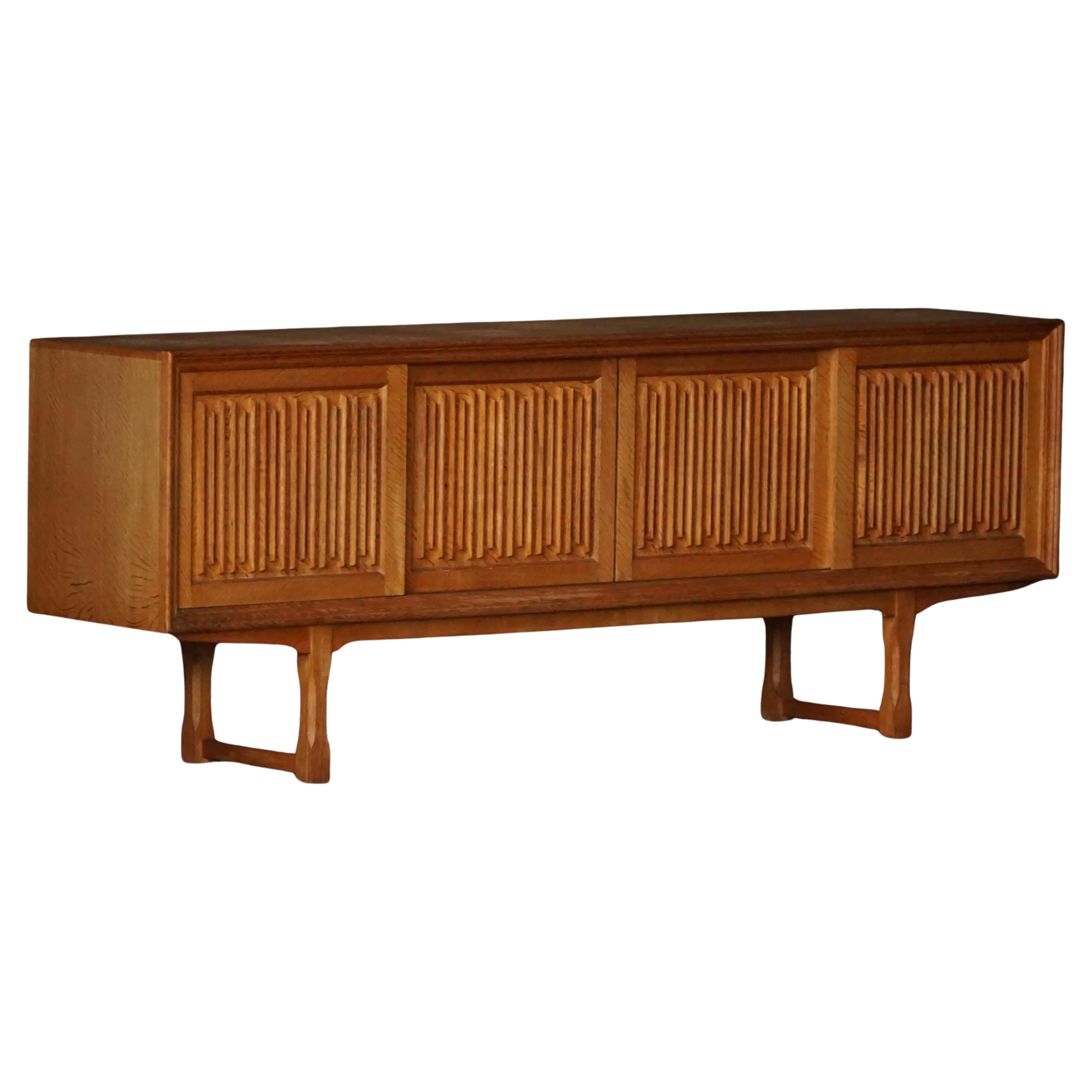 Low Sideboard in Oak by a Danish Cabinetmaker, 1960s, Mid Century Modern For Sale