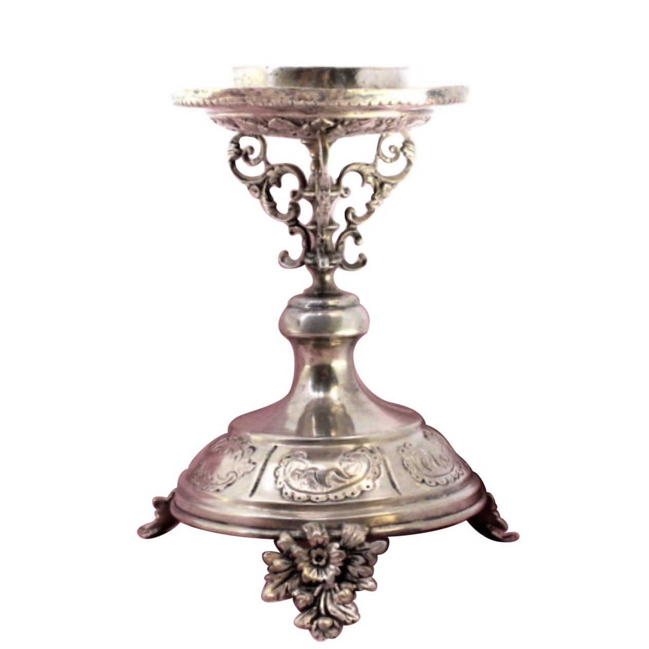 Low silver candlestick with relief engravings on round base with three legs