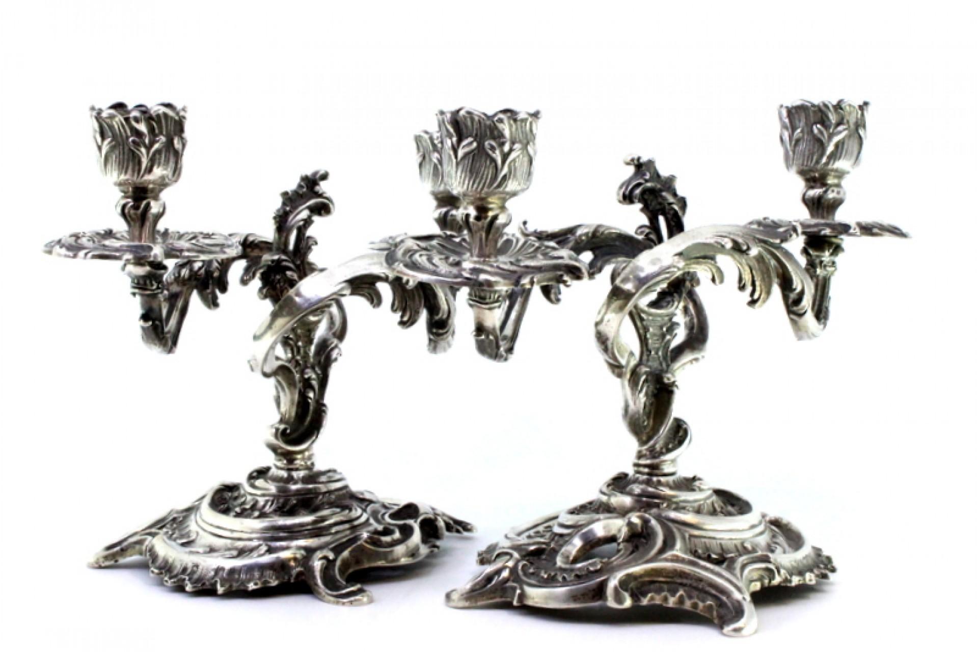 European Low silver two-light candelabra with shells, garlands and cut-out bases For Sale