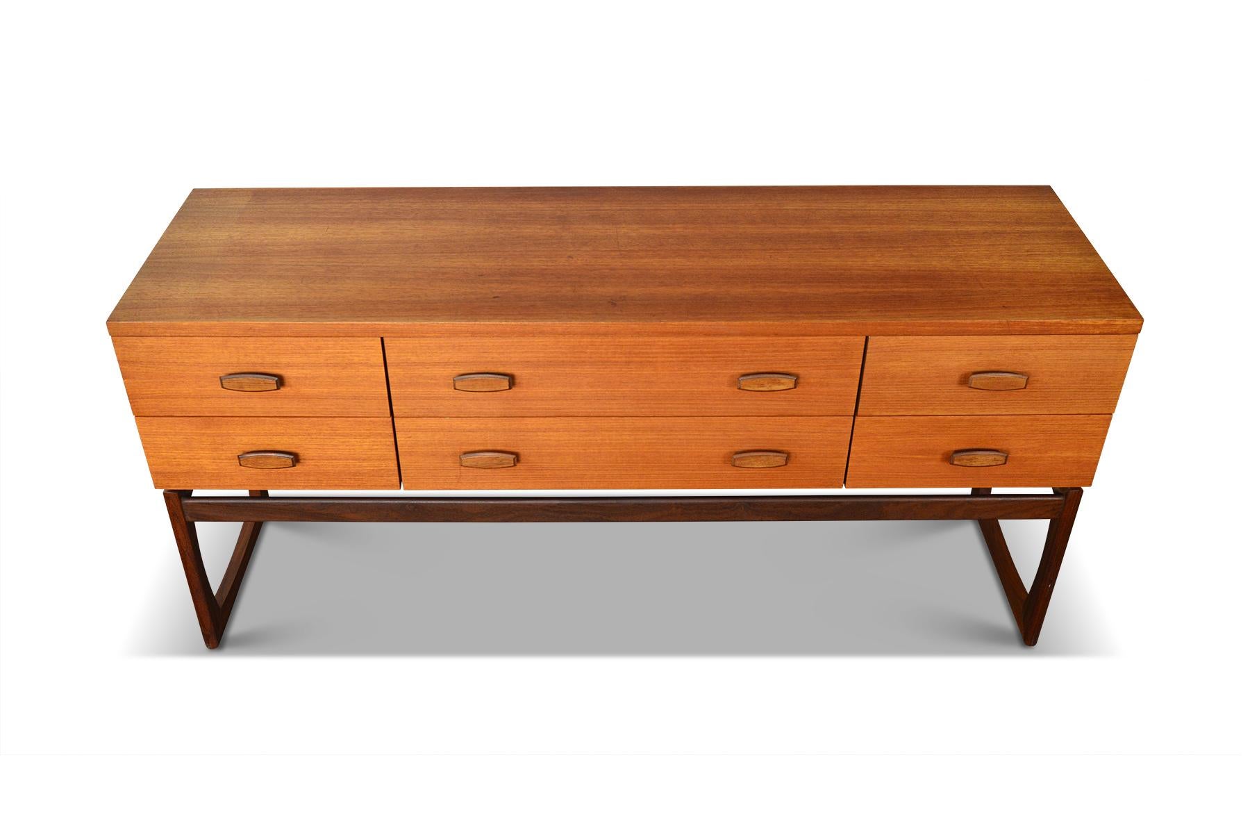 Origin: England
Designer: Victor B. Wilkins
Manufacturer: G Plan
Era: 1964
Materials: Teak, Rosewood, Afromosia
Measurements: 60? wide x 19? deep x 28? tall

Condition: In excellent original condition with typical wear for its vintage. Price
