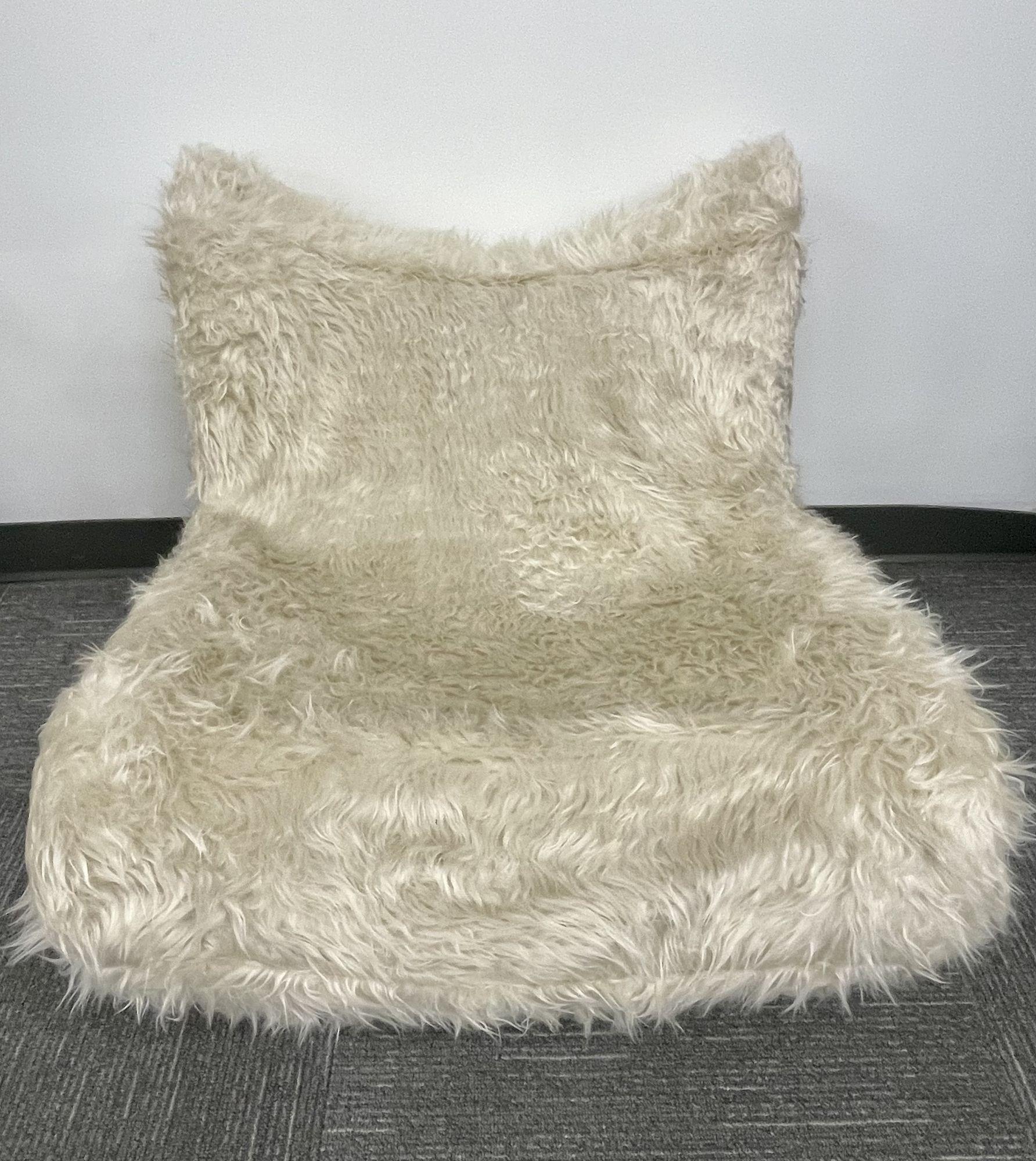 20th Century Low Slung Vintage Swivel Chair in New Fur For Sale