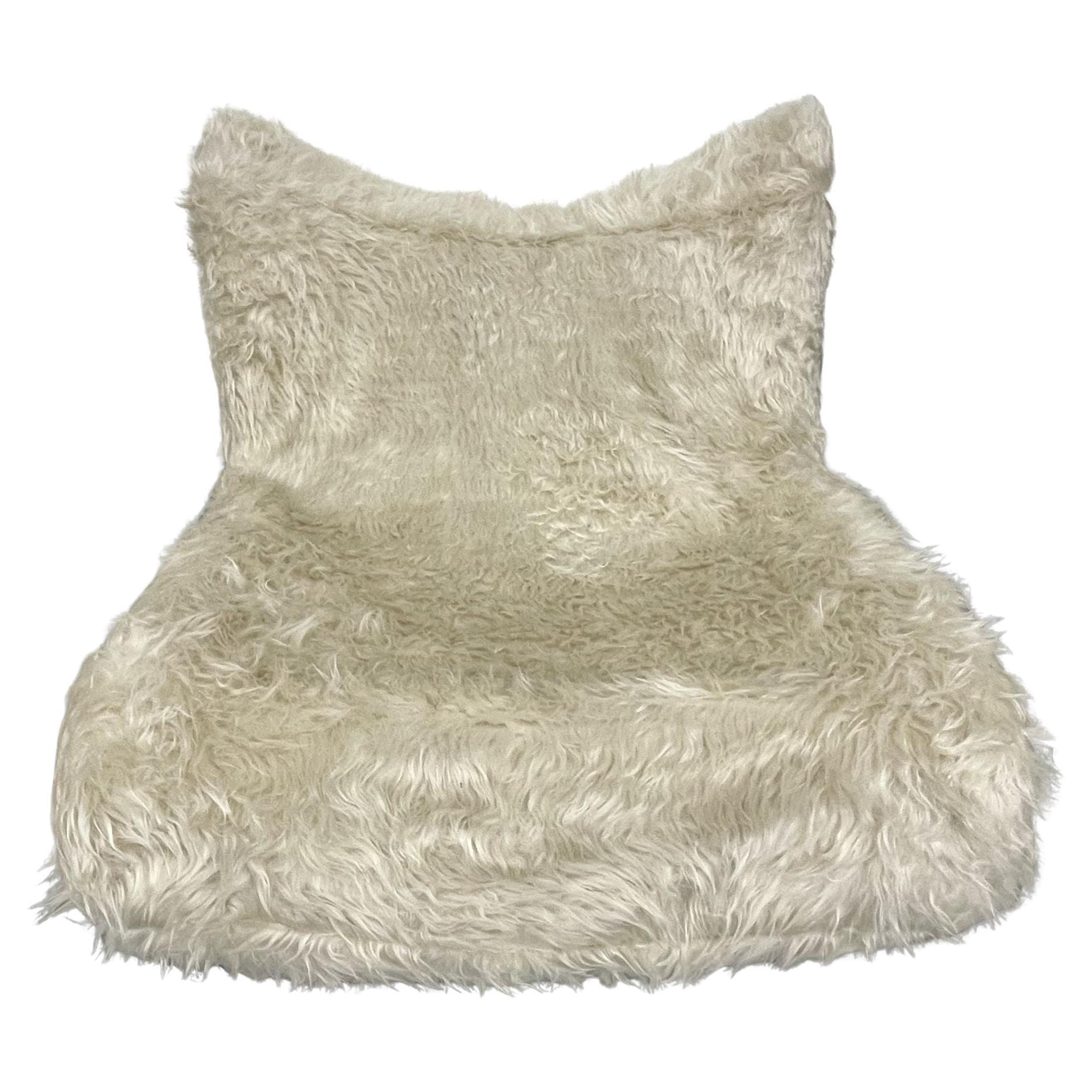 Low Slung Vintage Swivel Chair in New Fur For Sale