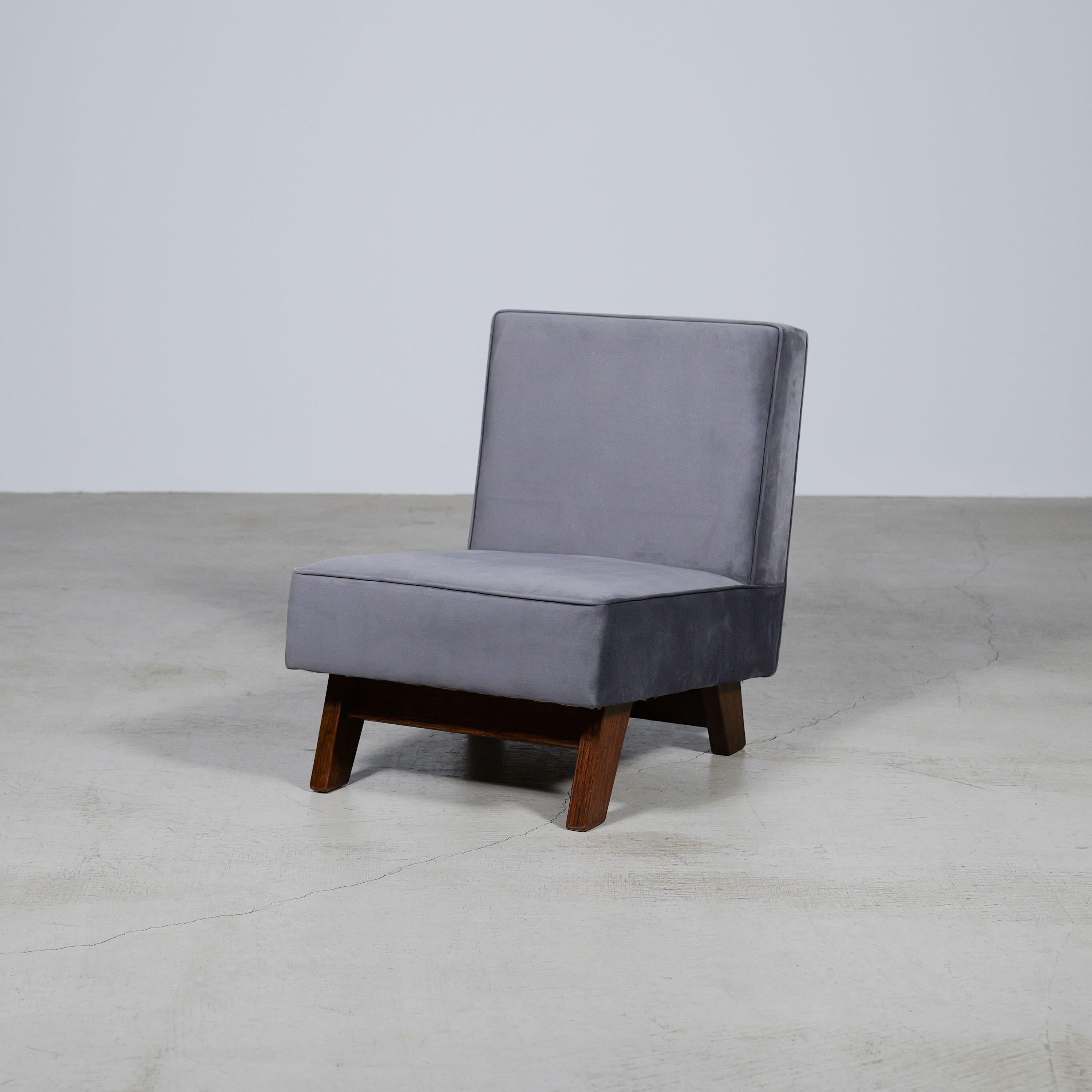 An authentic mid-century piece from Le Corbusier and Pierre Jeanneret’s legendary Chandigarh commission. Teak frame with fabric upholstered seat & back.