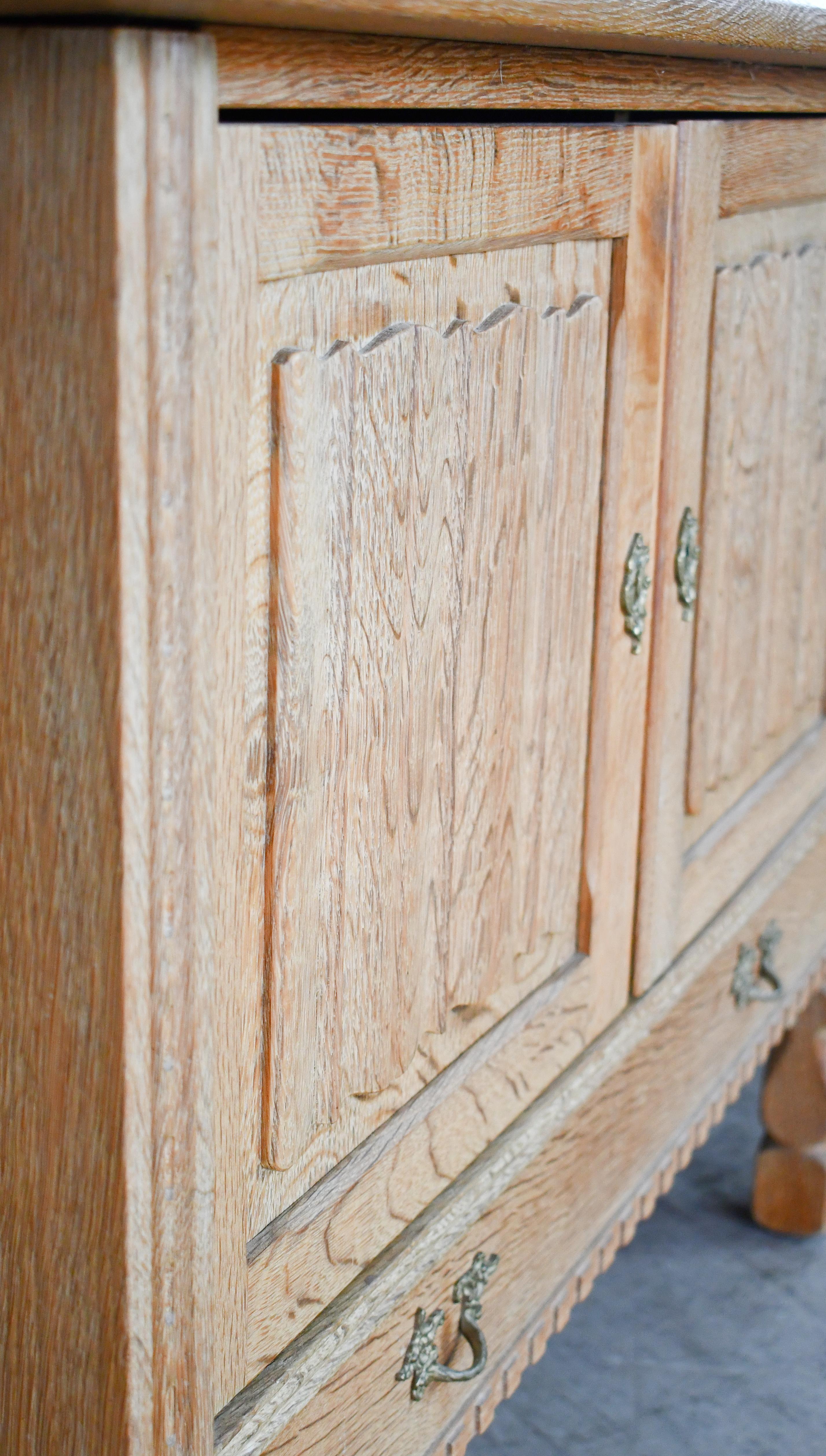 Danish Low Solid Carved Credenza in Oak by Henning Kjærnulf 60's For Sale
