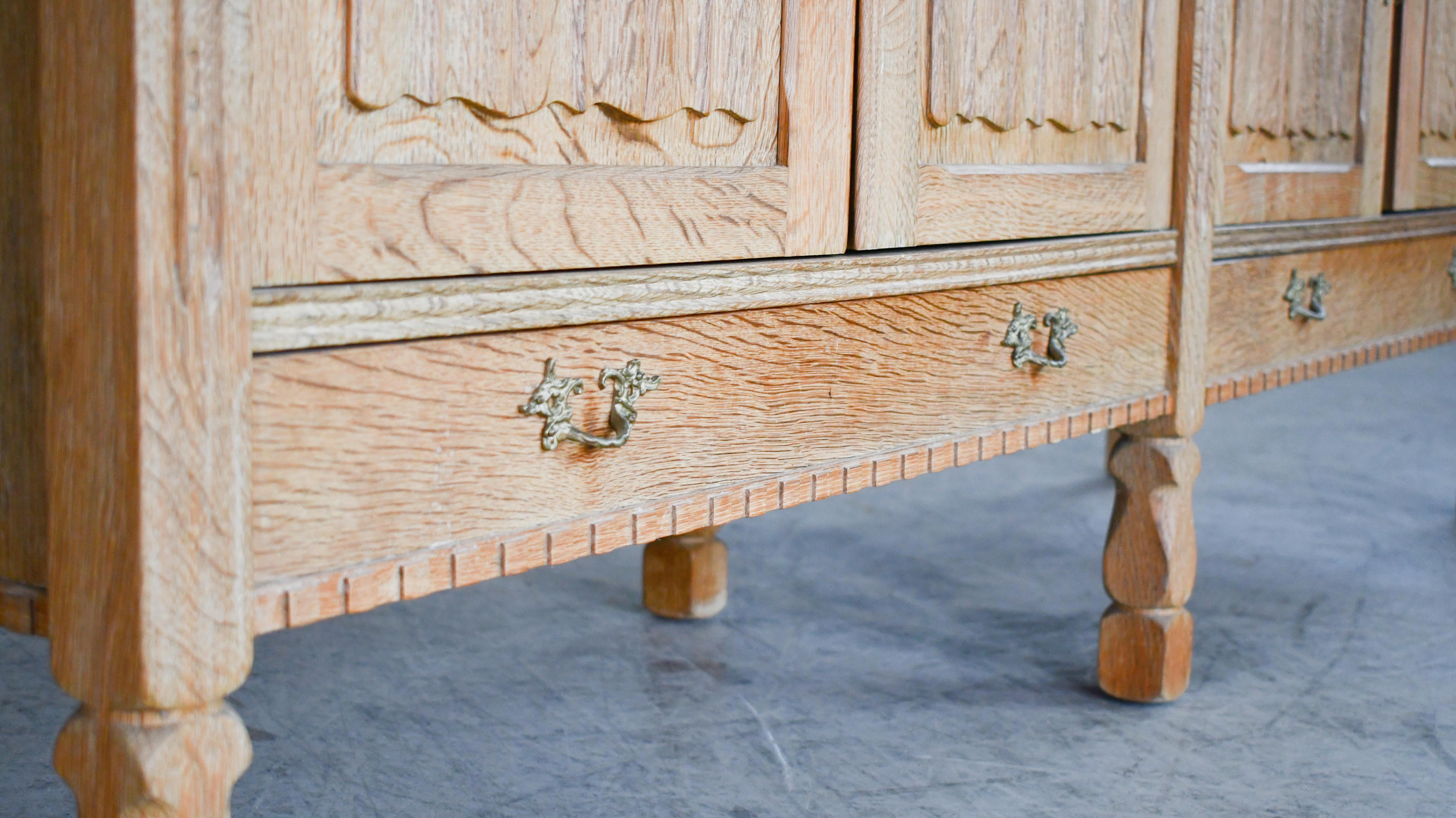 Low Solid Carved Credenza in Oak by Henning Kjærnulf 60's In Good Condition For Sale In Bridgeport, CT