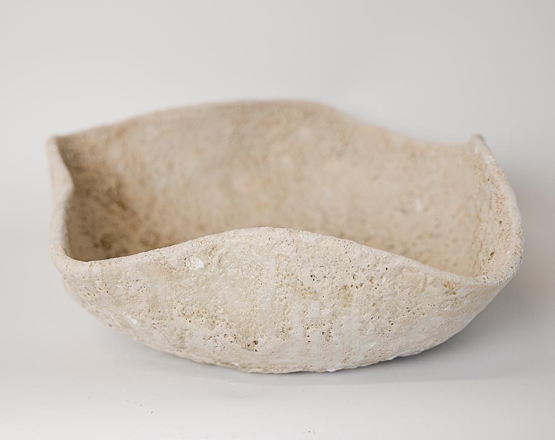 Discover the Relics Large Low Stoneware Planter Bowl, the perfect large sized bowl to use as a planter for orchids or other succulents on your table. This exquisite piece is handcrafted from stoneware clay and adorned with a crackle matte off-white