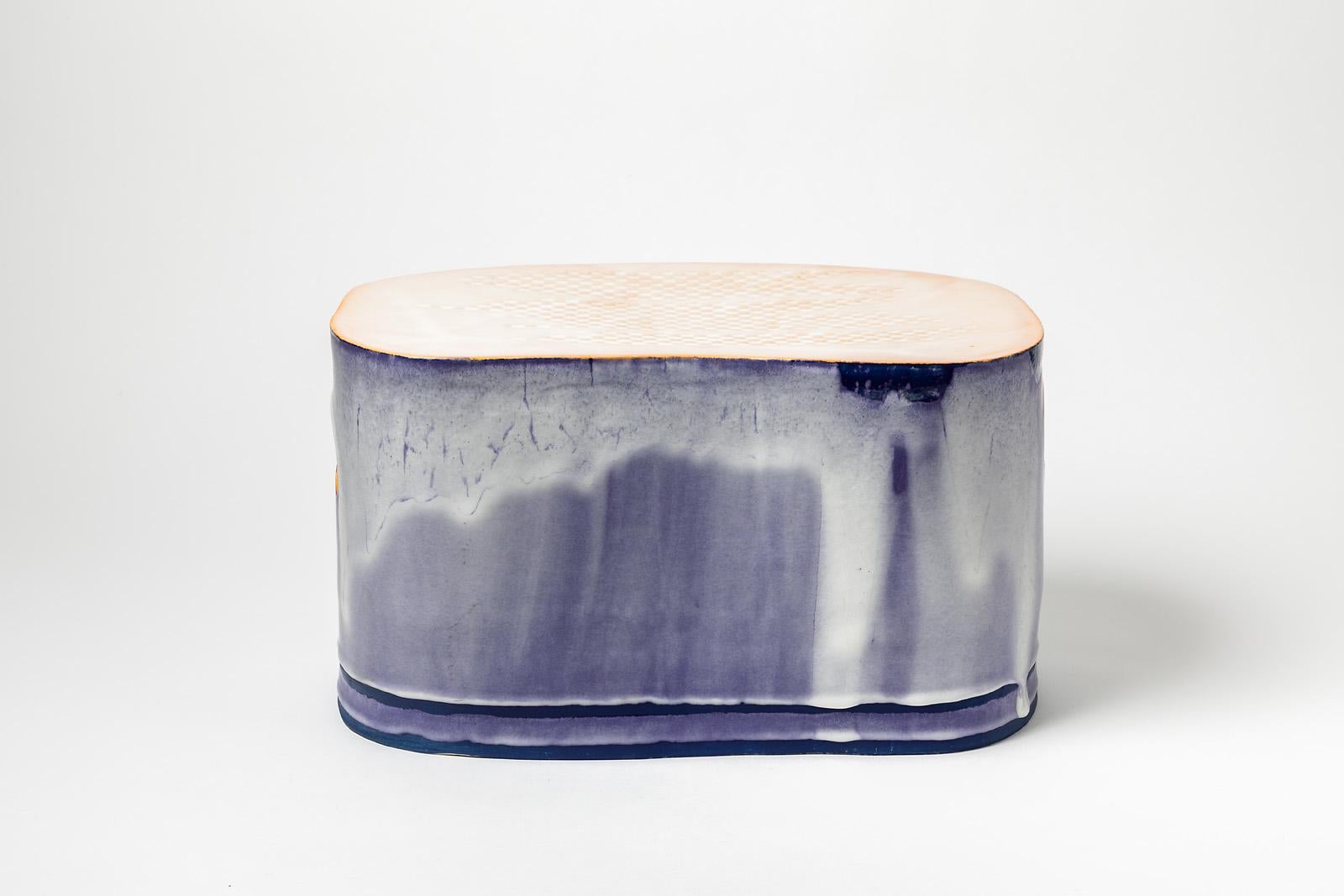 J. Morin

Low stoneware ceramic stool by French artist.

Elegant blue and white ceramic glazes colors.

Possibility of making them low coffee tables

Signed under the base. Perfect originals conditions.

Measures: Height 24 cm, large 41