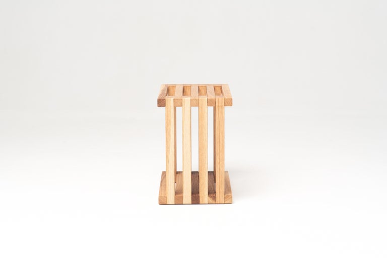 Low Stool
Designer: Ivan Voitovych
Dimensions of each: H 30 x 38 x 21
Materials: waxed oak wood (tinted color possible)
Weight: 4 kg

OSLINCHIK is a re-innovative project in which we decided to explore the theme of ancient traditional objects
