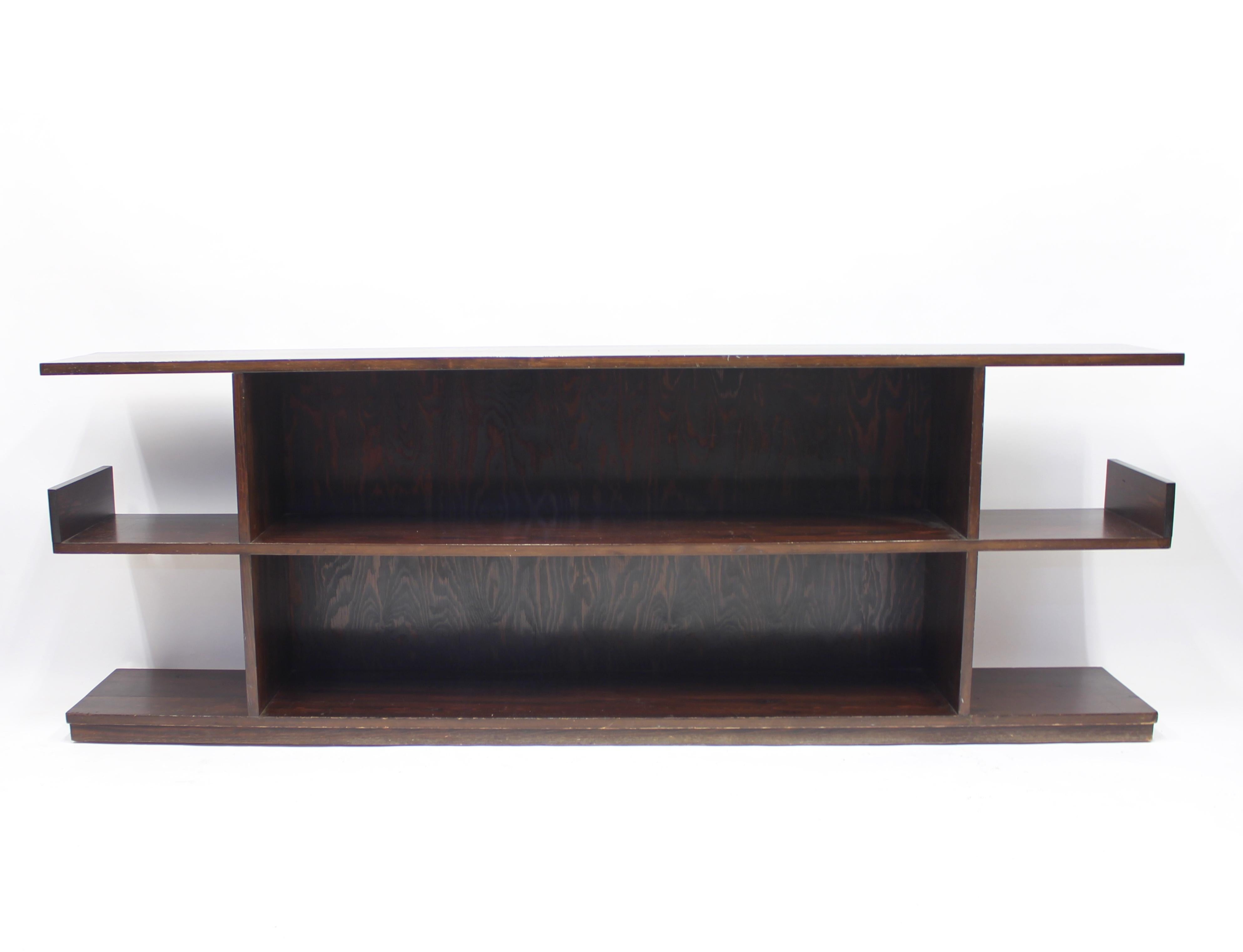 Low Swedish bookshelf/sideboard in stained birch and stained pine attributed to Axel Einar Hjorth, made in the 1930s. Very good vintage condition with light ware.