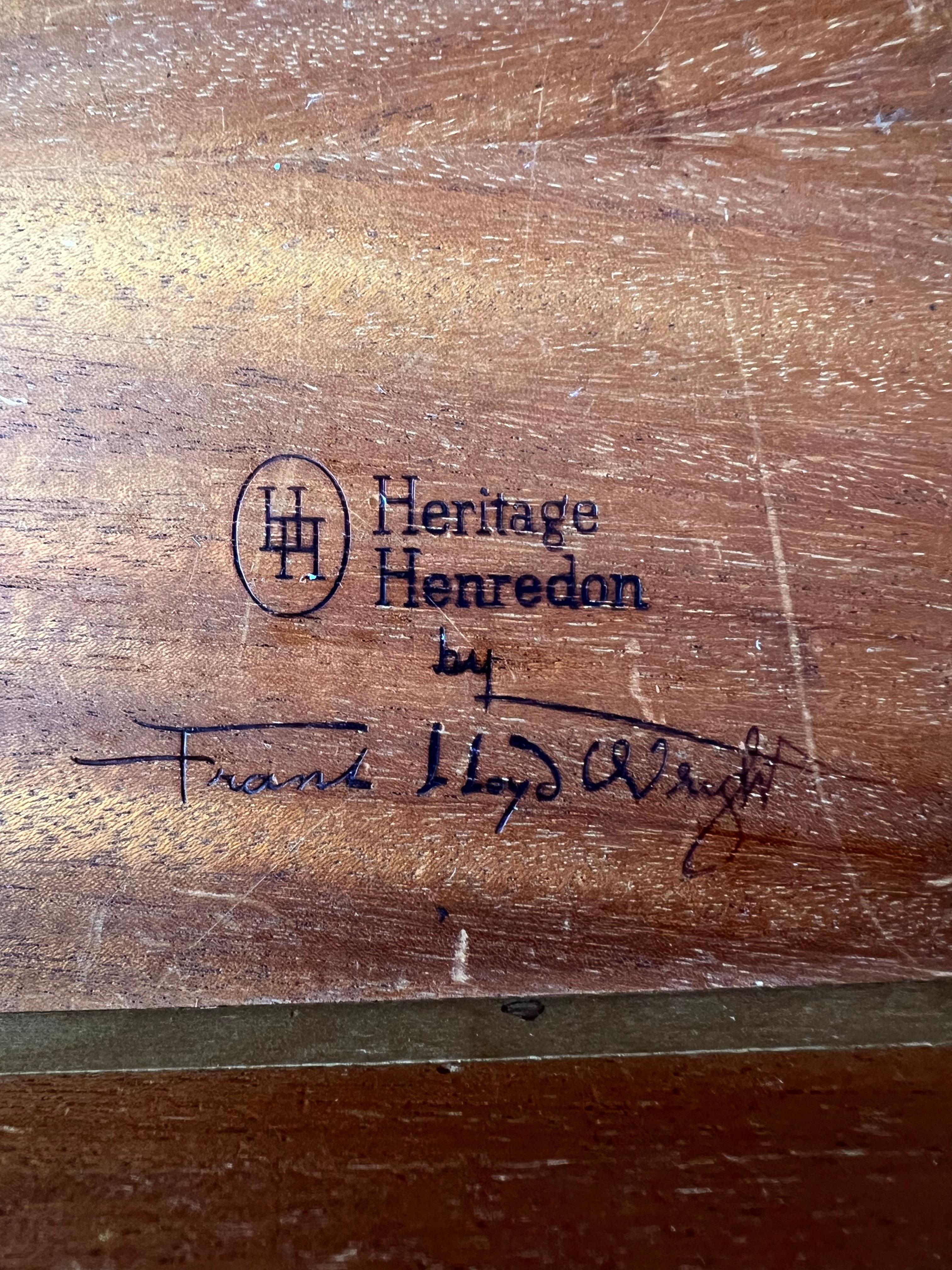 A low table in mahogany made in 1955 by Frank Lloyd Wright. Part of a series of furniture produced by Heritage Henredon. Perfectly proportioned table with internal drawer.