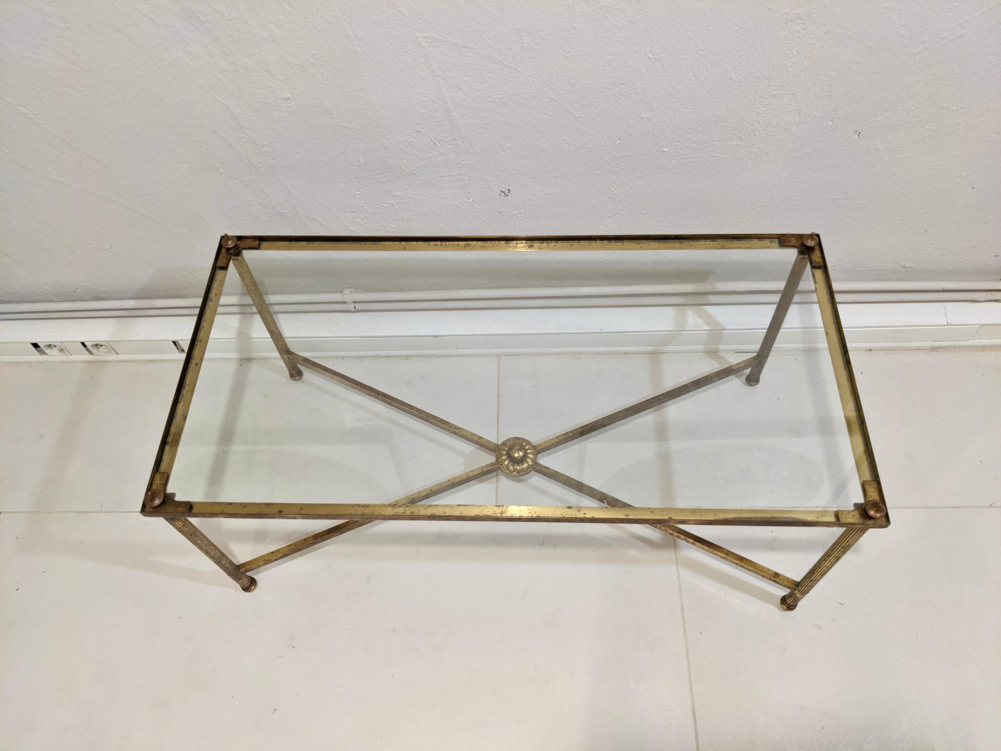 Low table by Maison Jansen. Brass and glass top. 1970's. Good condition.
 