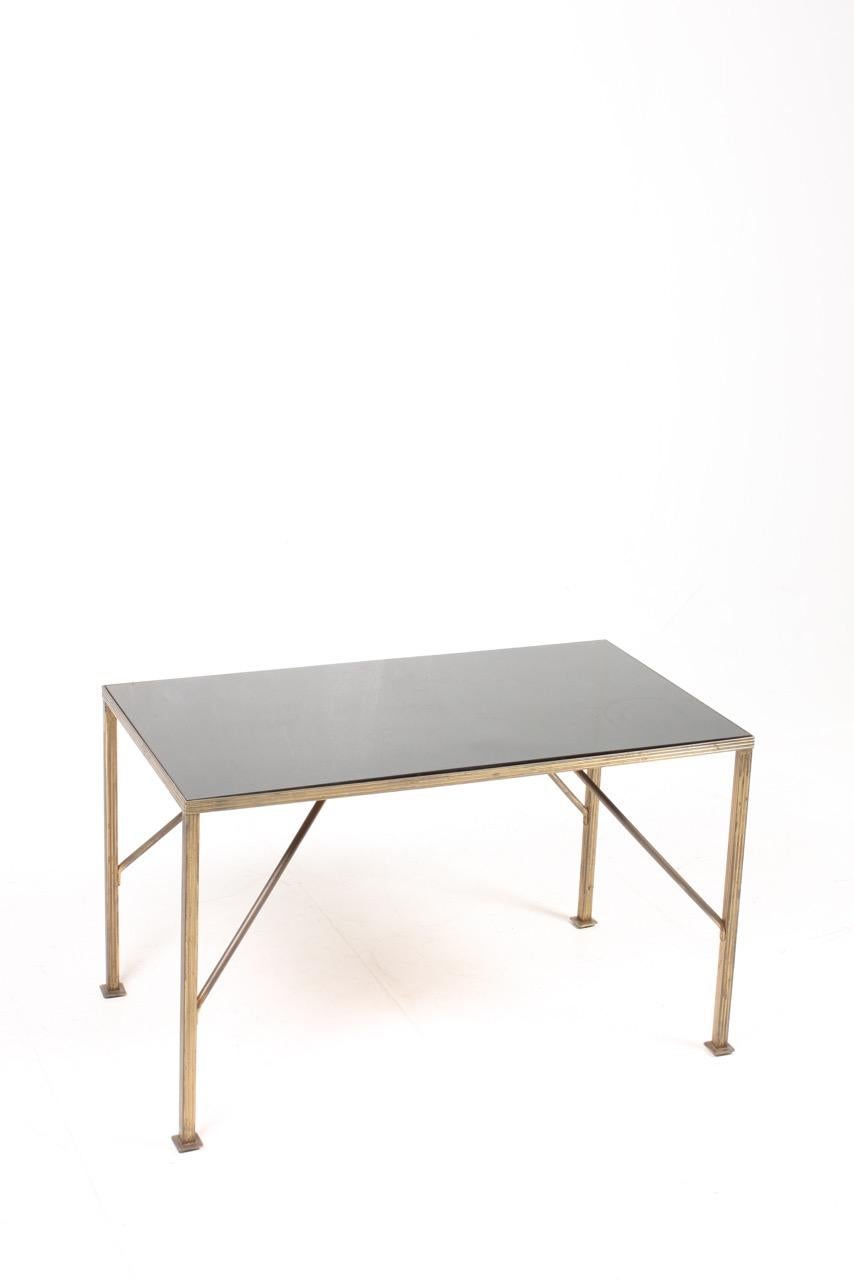 Scandinavian Modern Low table in Brass with Glass top by Lysberg Hansen & Terp, 1940s