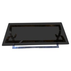 Low table in chromed metal and smoked glass 1970