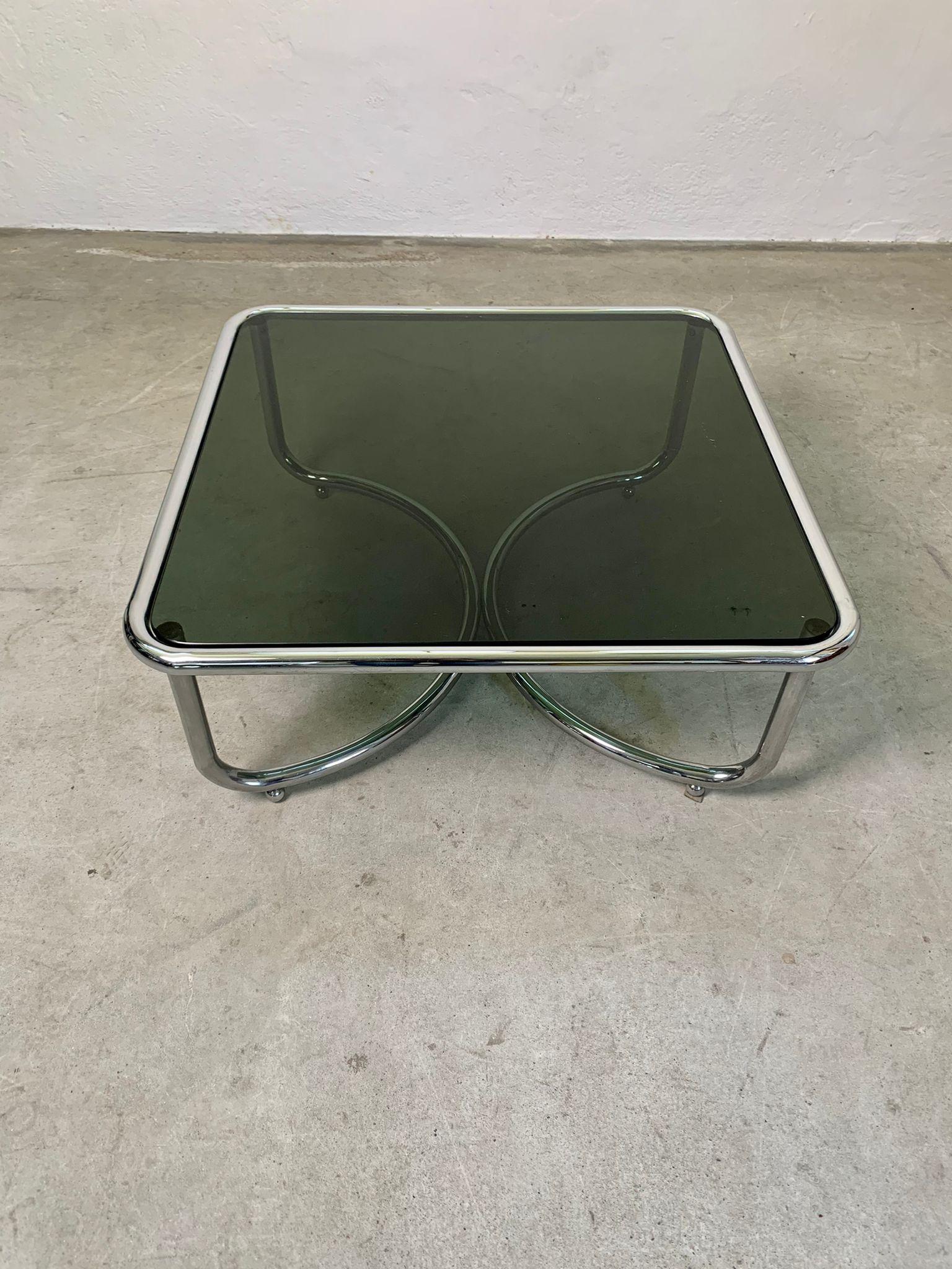 Low table with smoked glass top and chromed steel frame by Gae Aulenti for Poltronova, 1964

Low table with smoked glass top and chromed steel frame with wheels. Beautiful model made by Gae aulenti for Poltronova.