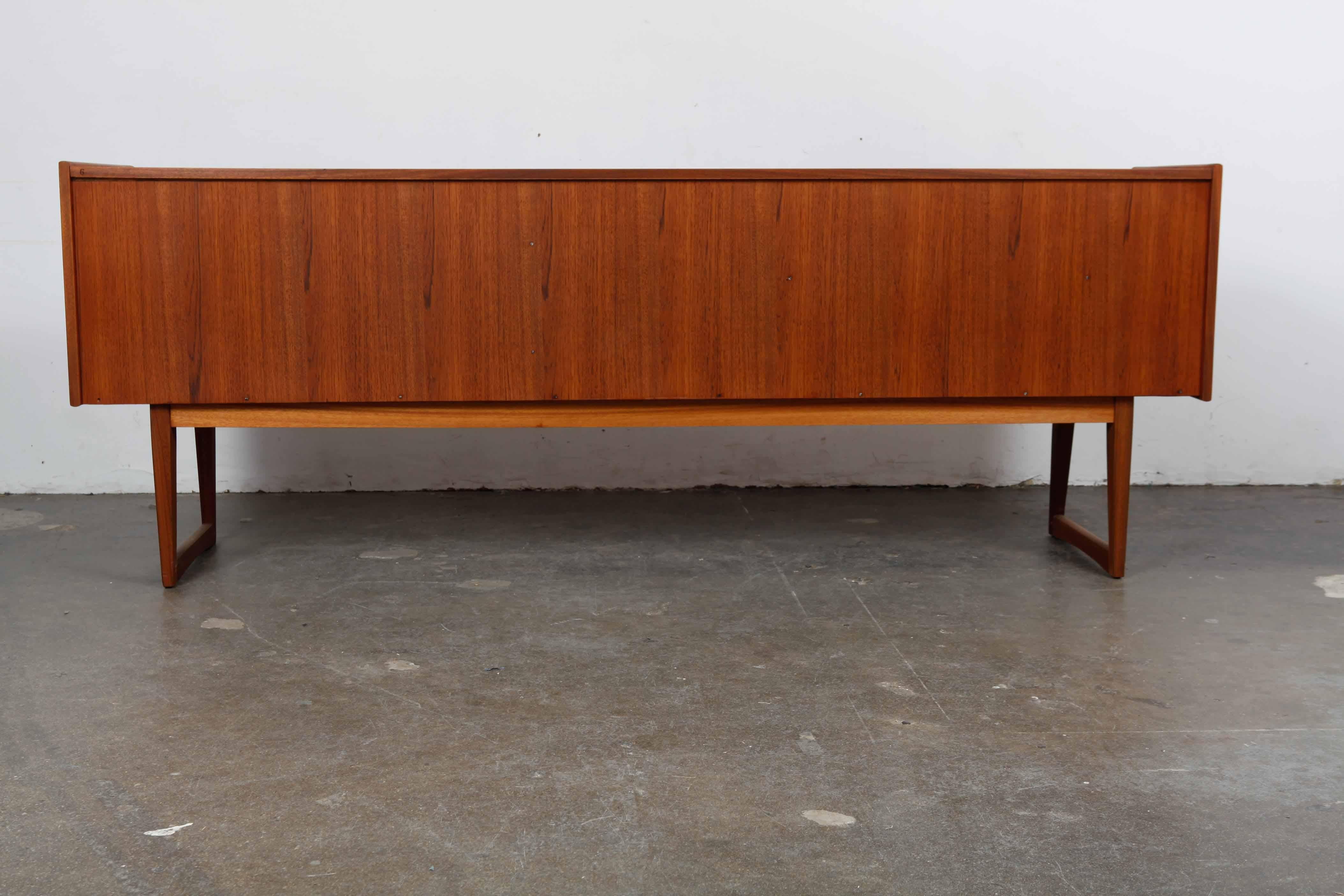 English Low Teak Sideboard by A. Younger Ltd. Newly Refinished For Sale