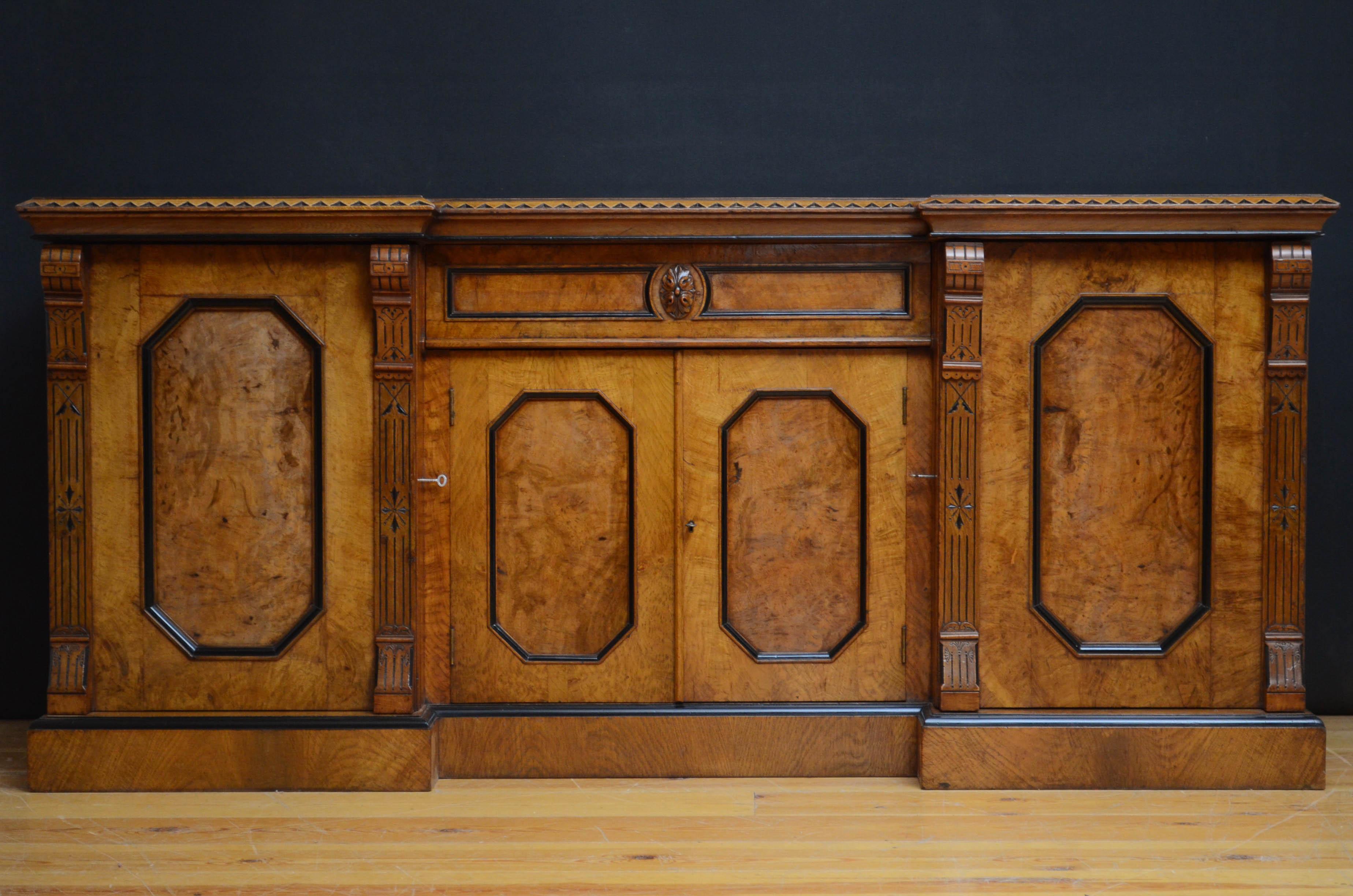 Sn4674, truly impressive, Victorian, Aesthetic Movement, break centre, pollard oak sideboard, having ebonised dog tooth borders to the top, single, panelled drawer with floral decoration to the centre above pair of canted rectangular, panelled