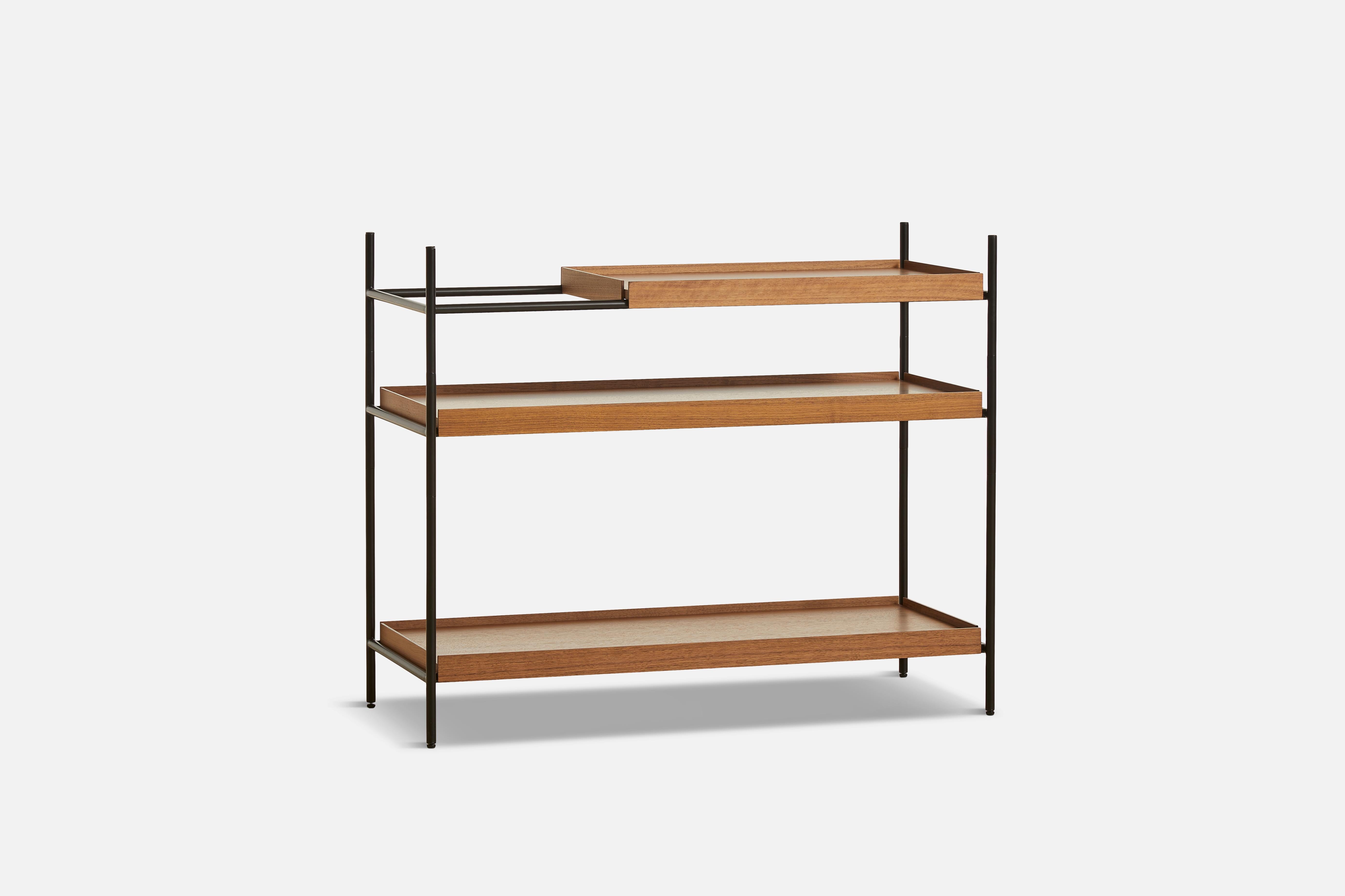 Low Walnut Tray shelf by Hanne Willmann
Materials: Metal, walnut.
Dimensions: D 40 x W 100 x H 81 cm
Also available in different tray conbinations and 2 sizes: H81, H 201 cm.

Hanne Willmann is a dynamic German designer with her own multidisciplinar