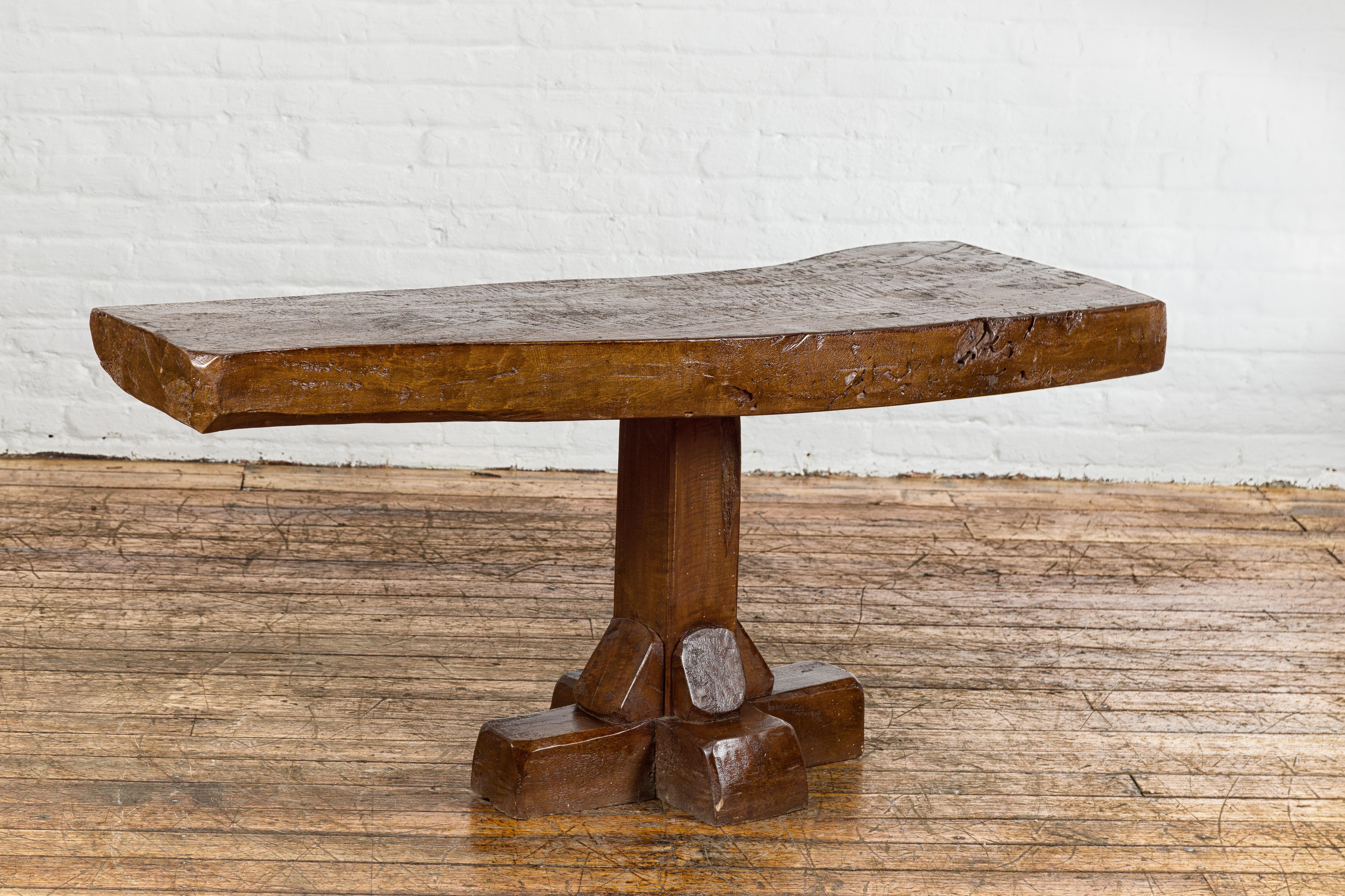 Javanese Low Wooden Console Table with Rustic Top and Pedestal Base For Sale