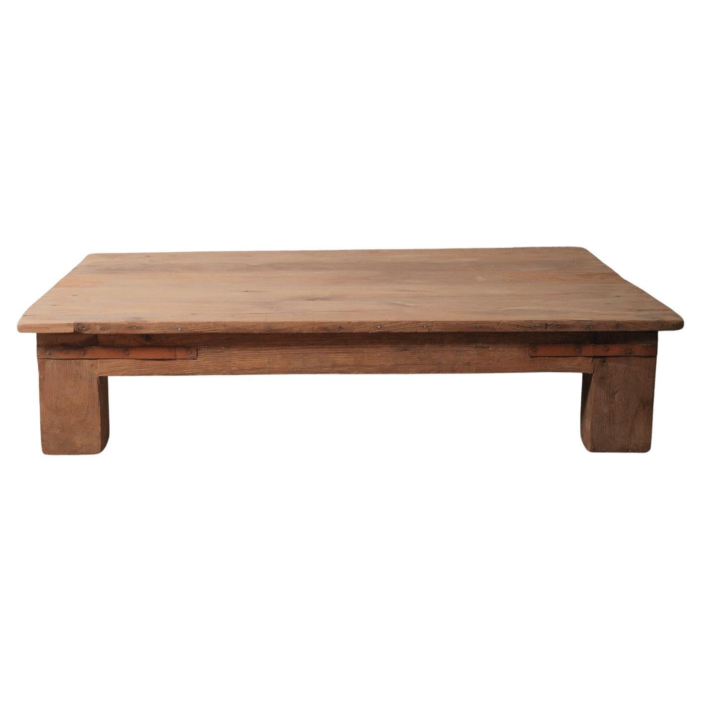 Low Wooden Platform Coffee Table with Thick Block Legs For Sale