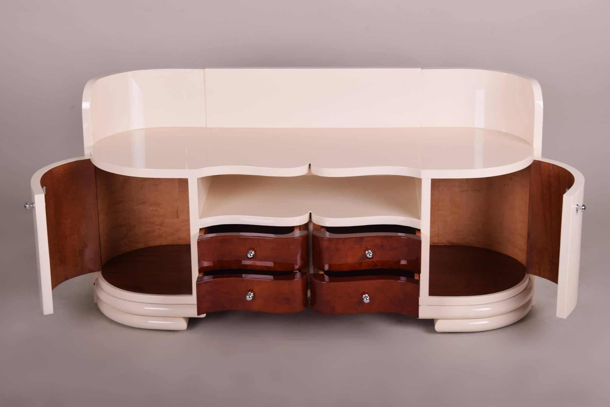Low Art Deco dressing commode from Czechoslovakia, 1930-1939.
Color ivory.

We guarantee safe a the cheapest air transport from Europe to the whole world within 7 days.
The price is the same as for ship transport but delivery time is really
