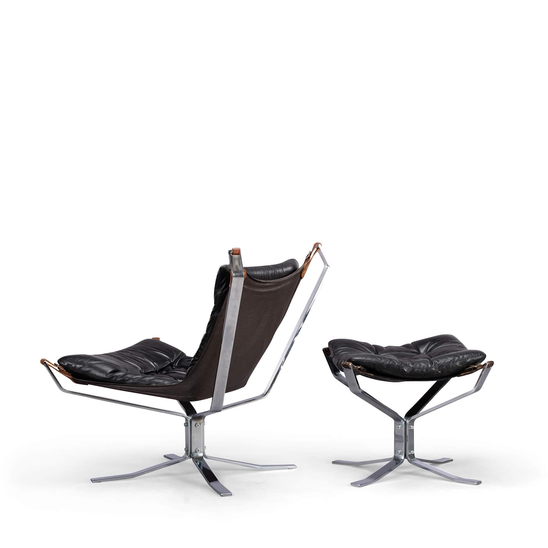 An incredibly rare complete and original Falcon lounge set by Mid century Norwegian designer Sigurd Ressell for Vatne Møbler. Featuring the original chrome frame version of the chair design in black leather a matching footstool and the original