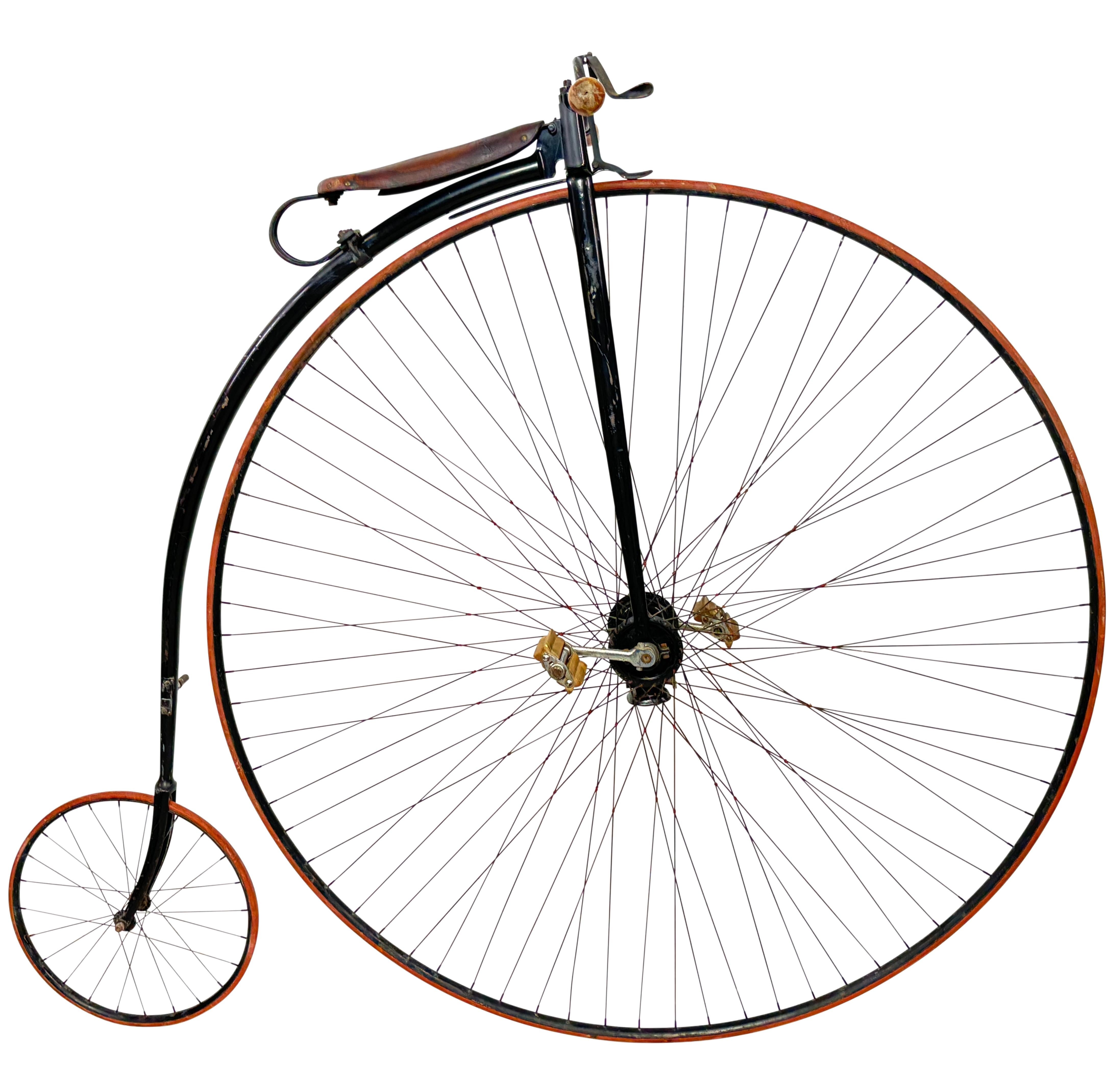1880's accurate replica Penny Farthing High-Wheel bicycle custom made by the Lowell Kennedy Company in Defiance Ohio in the 1970's. 
Functional bike, but seat needs to be repaired and the tires replaced if the intention is to ride.
The wheel