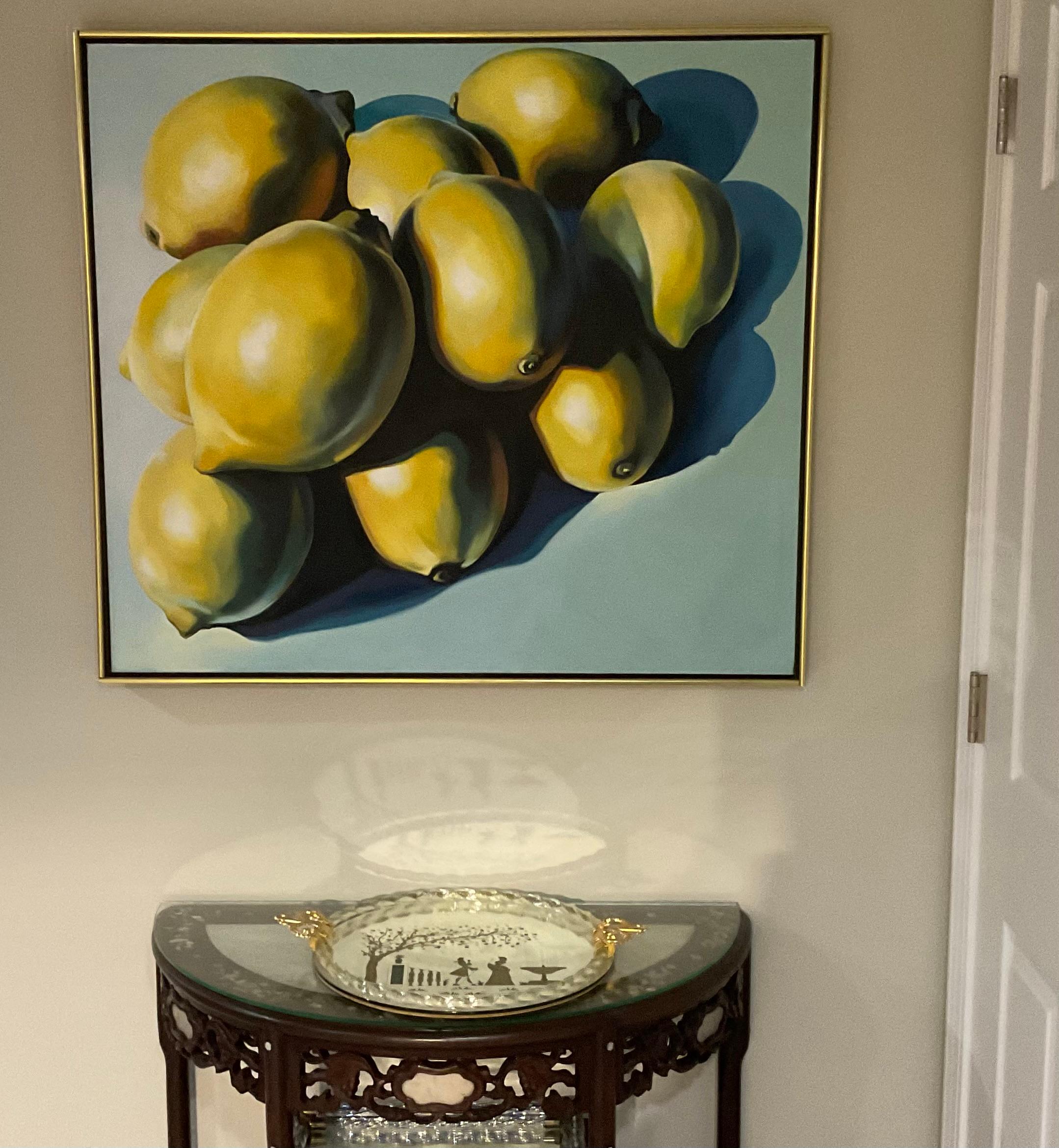Artistics : Lowell Blair Nesbitt, Américain (1933 - 1993) Titre : Dix citrons sur fond bleu Année : 1978 Médium : Huile sur toile, signée et datée au verso Avec étiquettes originales 