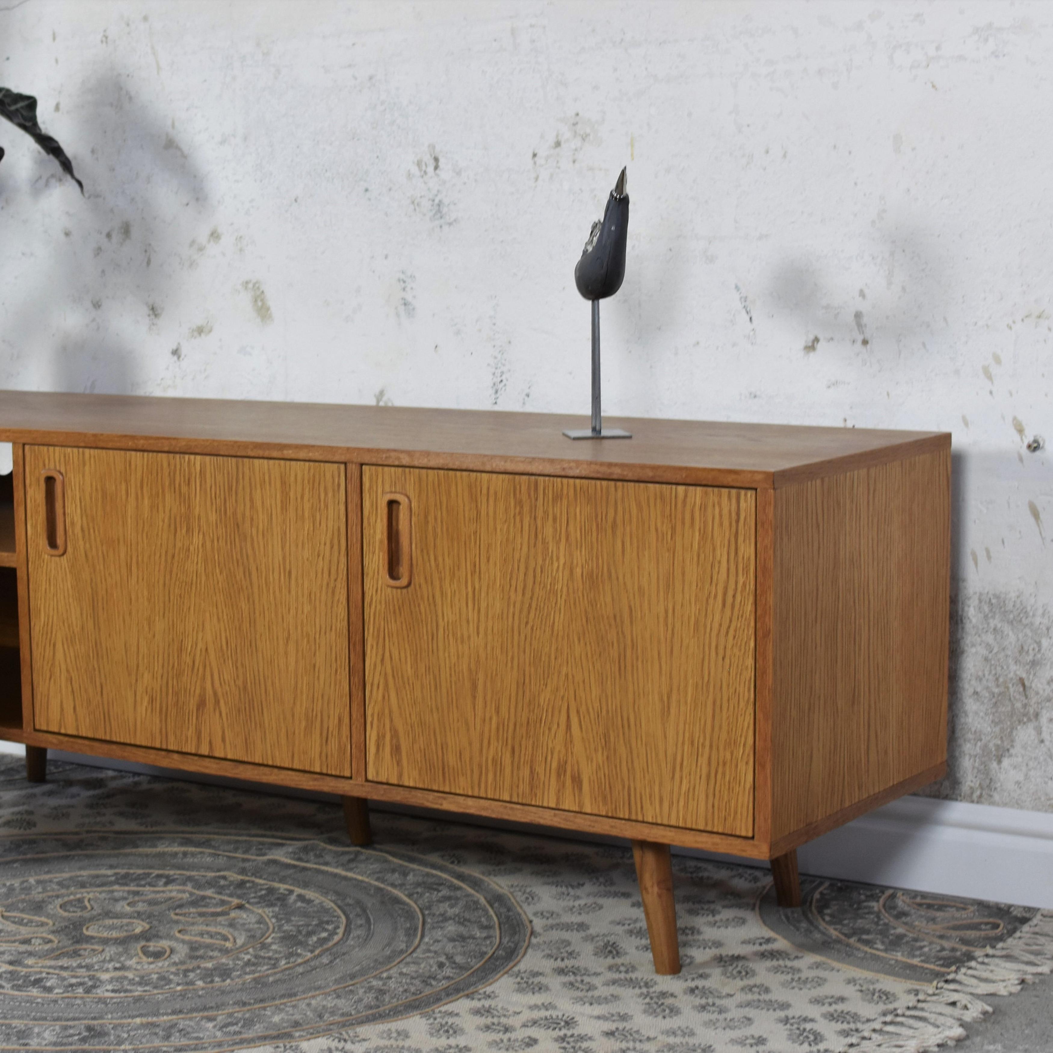 Lowo Medium Sideboard by Pastform
Dimensions: D 40 x W 170 x H 60 cm.
Materials: Stained and varnished wood.

Available in different wood color finishes: Whiskey, Rum, BPA, Nobel, Brandy, Schwarz, and Natura. Prices may vary. Available in three