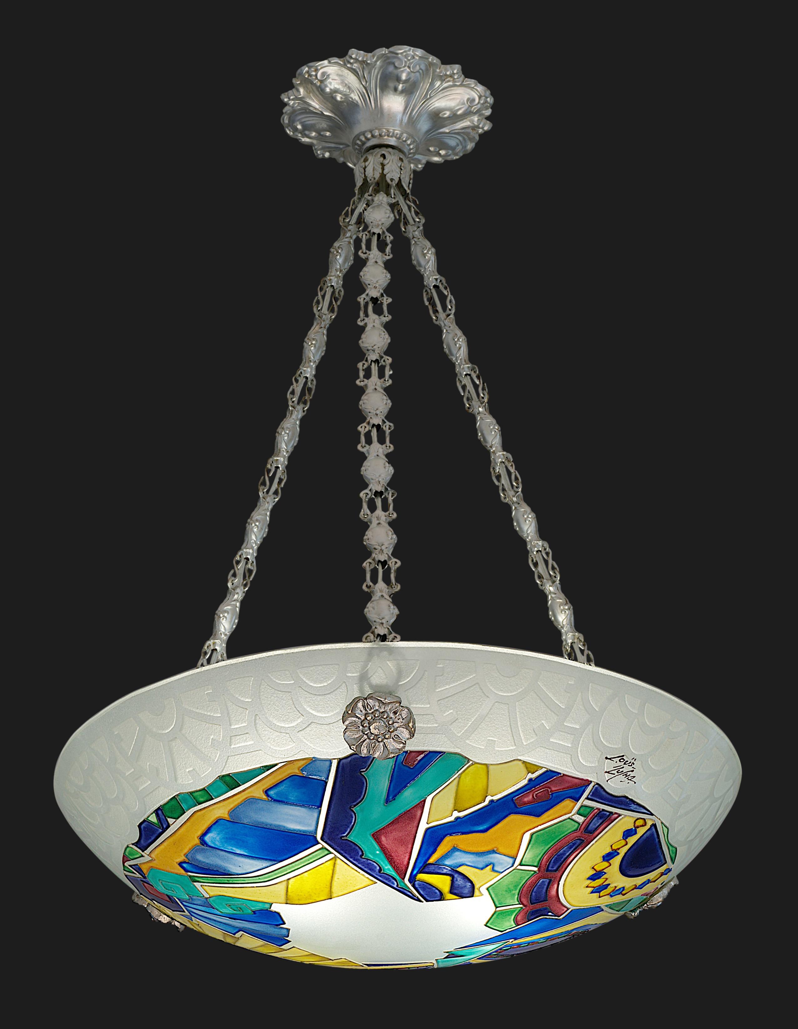 French Art Deco pendant chandelier by Loys LUCHA (Paris), France, 1920s. Etched (edge) and enameled (pattern) glass shade hung at its stamped silverplate fixture. Measures: Height : 18.9