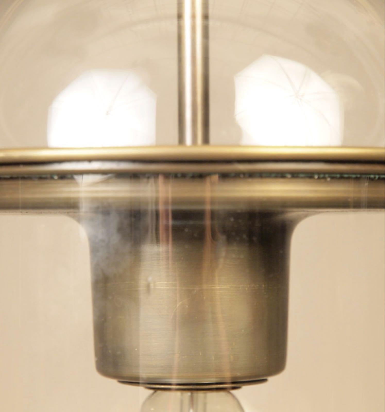 A sophisticated capsule-shaped pendant light.
We have only one stock.