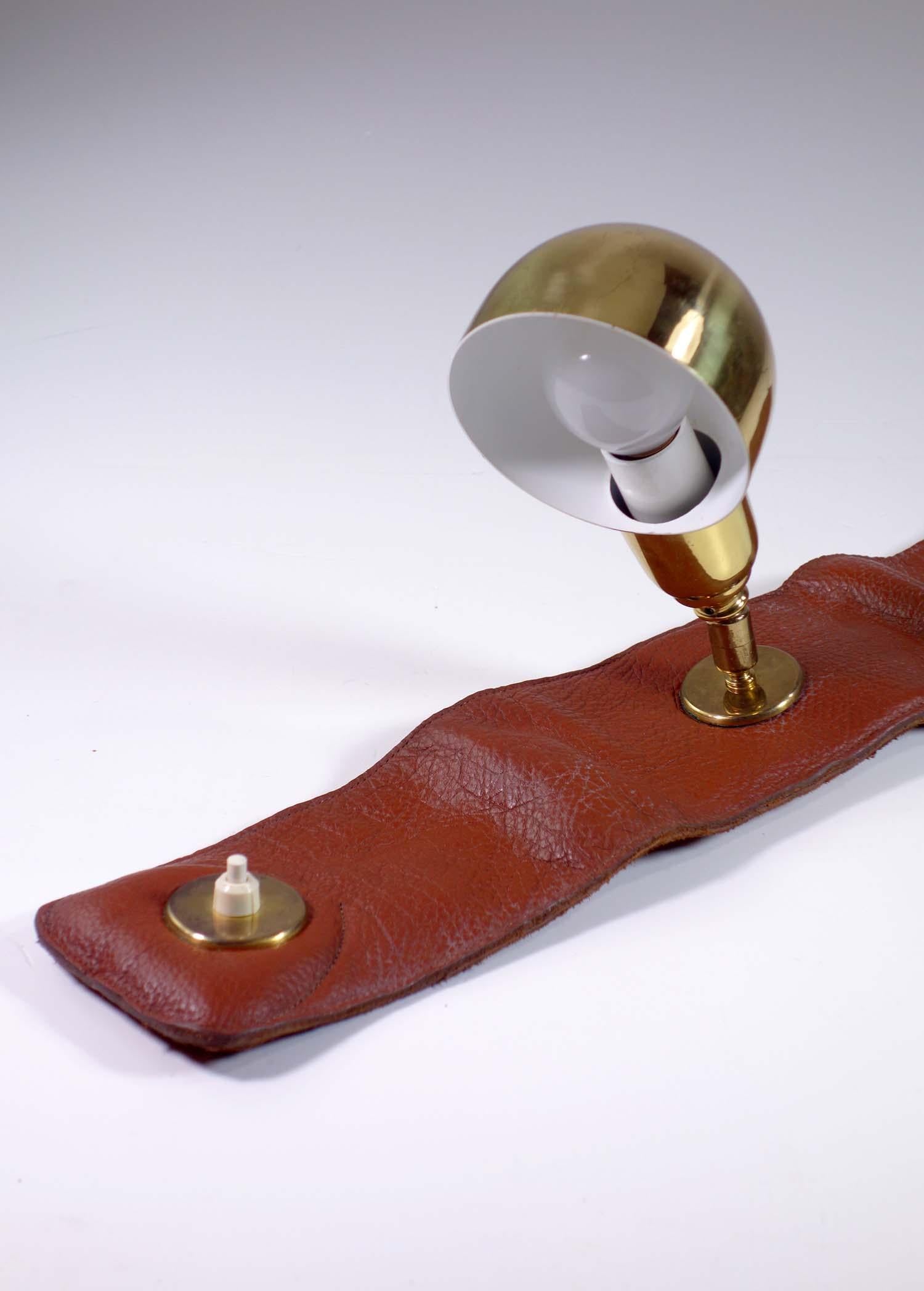LP01 Armchair Lamp
Luigi Caccia Dominioni
Azucena, 1979 

Brass and brown leather
First edition. 
