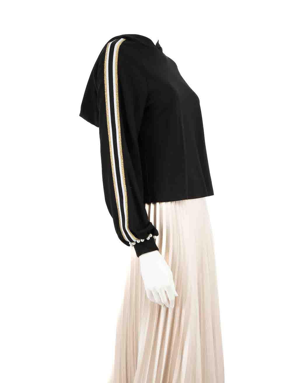 CONDITION is Very good. Hardly any visible wear to hoodie is evident on this used LPA designer resale item.
 
 
 
 Details
 
 
 Black
 
 Synthetic
 
 Hoodie
 
 Pearl cuff detail
 
 Sleeve stripe tape detail
 
 Cropped
 
 
 
 
 
 Made in China
 
 
 
