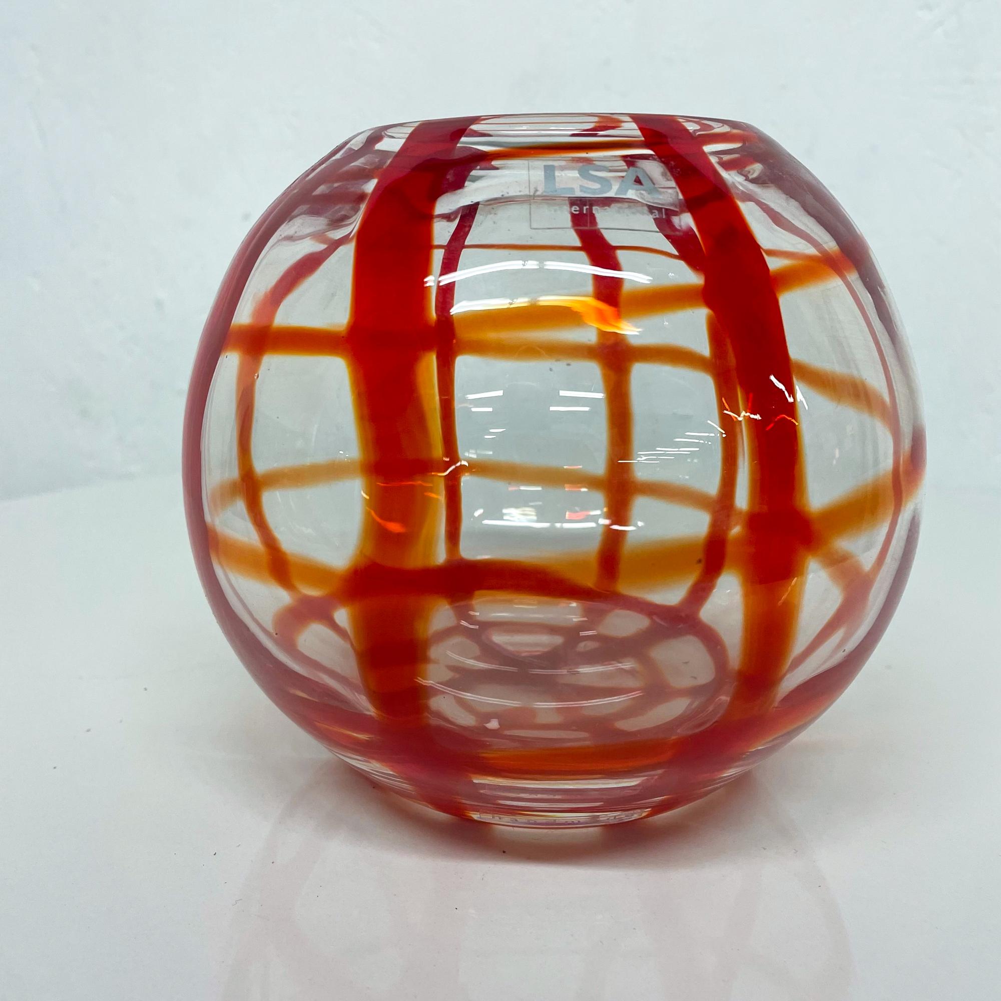 LSA International Art glass vase mouth blown made in Poland 
Handcrafted Lively pattern of Bold Red Lines
Measures: 6.5 diameter x 6 tall inches
Original preowned vintage condition.
See our images.
  