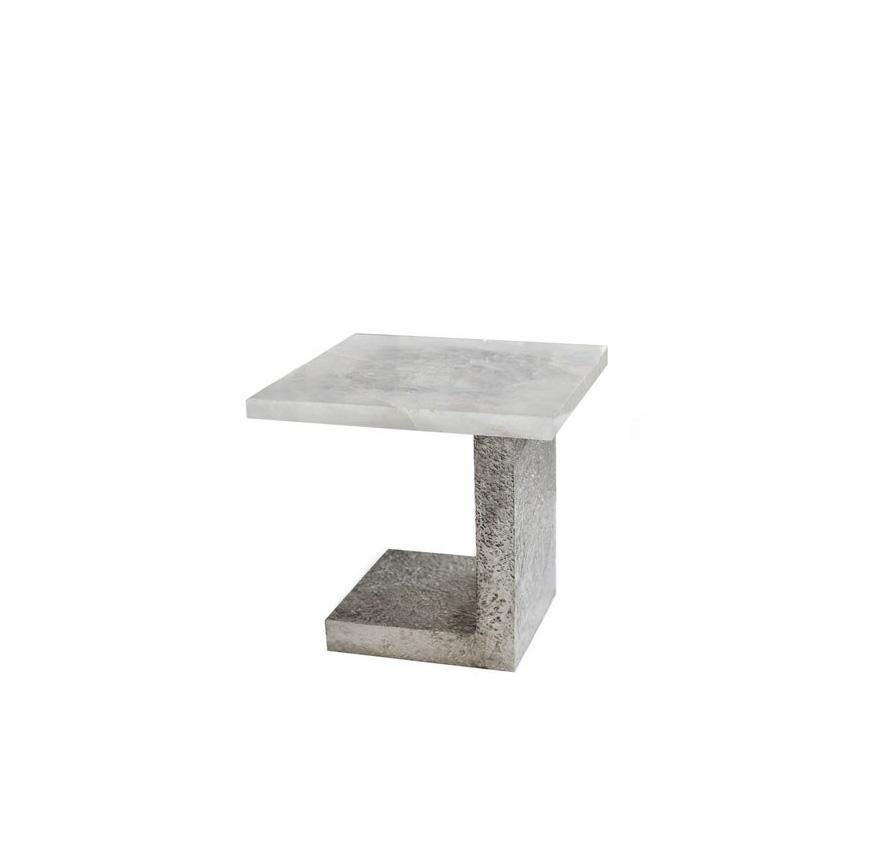 Luxury white rock crystal quartz side table with hammered nickel finish base. Created by Phoenix Gallery, NYC.
Custom size, finish, and quantity upon request.