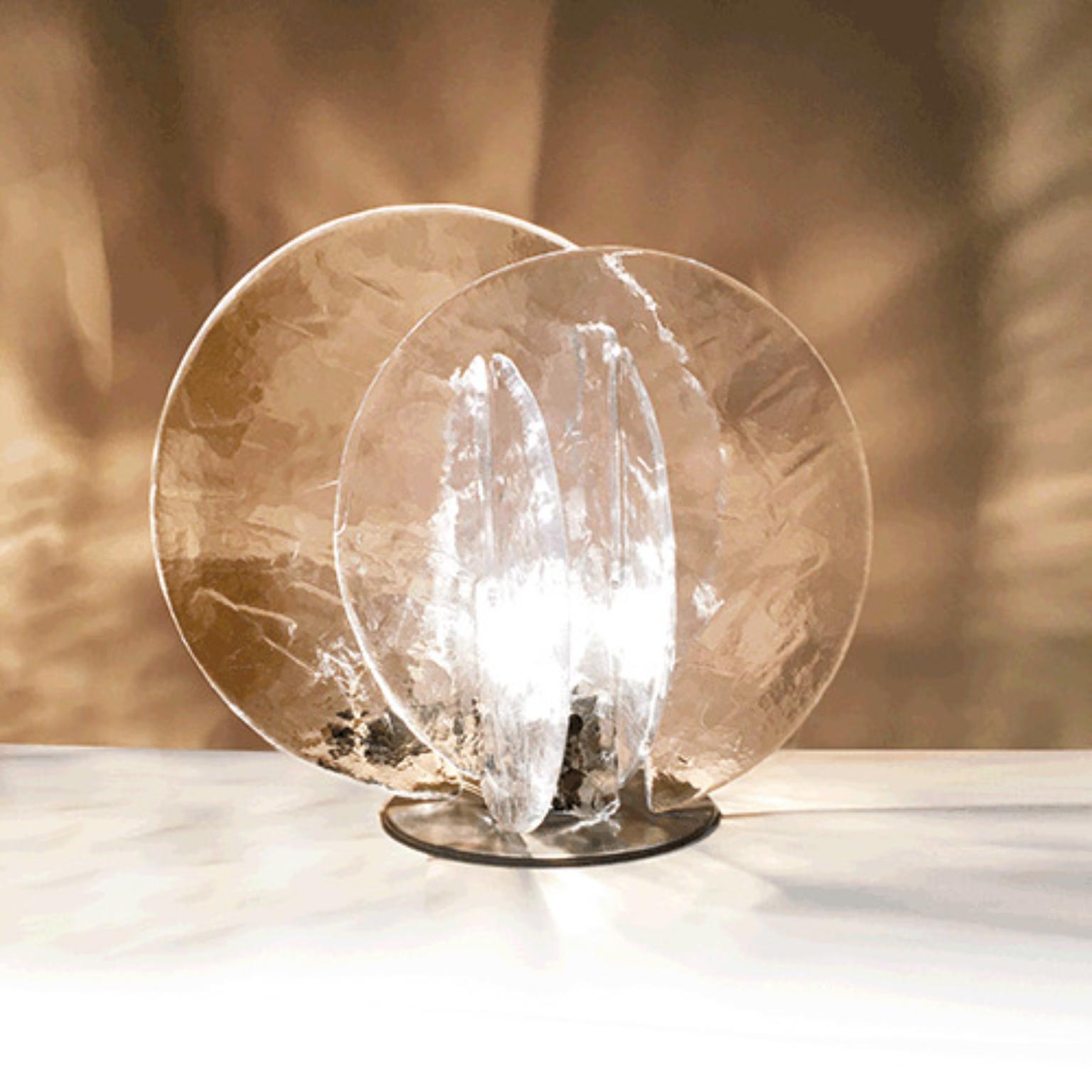 LT335 335TAM Table Lamp by Mazzega 1946
Dimensions: W 56 x D 48 x H 48 cm.
Materials: Frame: Brushed Copper. 
Diffuser: Crystal Pulegoso.
Weight: 015 Kg.

The roots of Mazzega1946 are in Murano, a land of master glassmakers who still today preserve