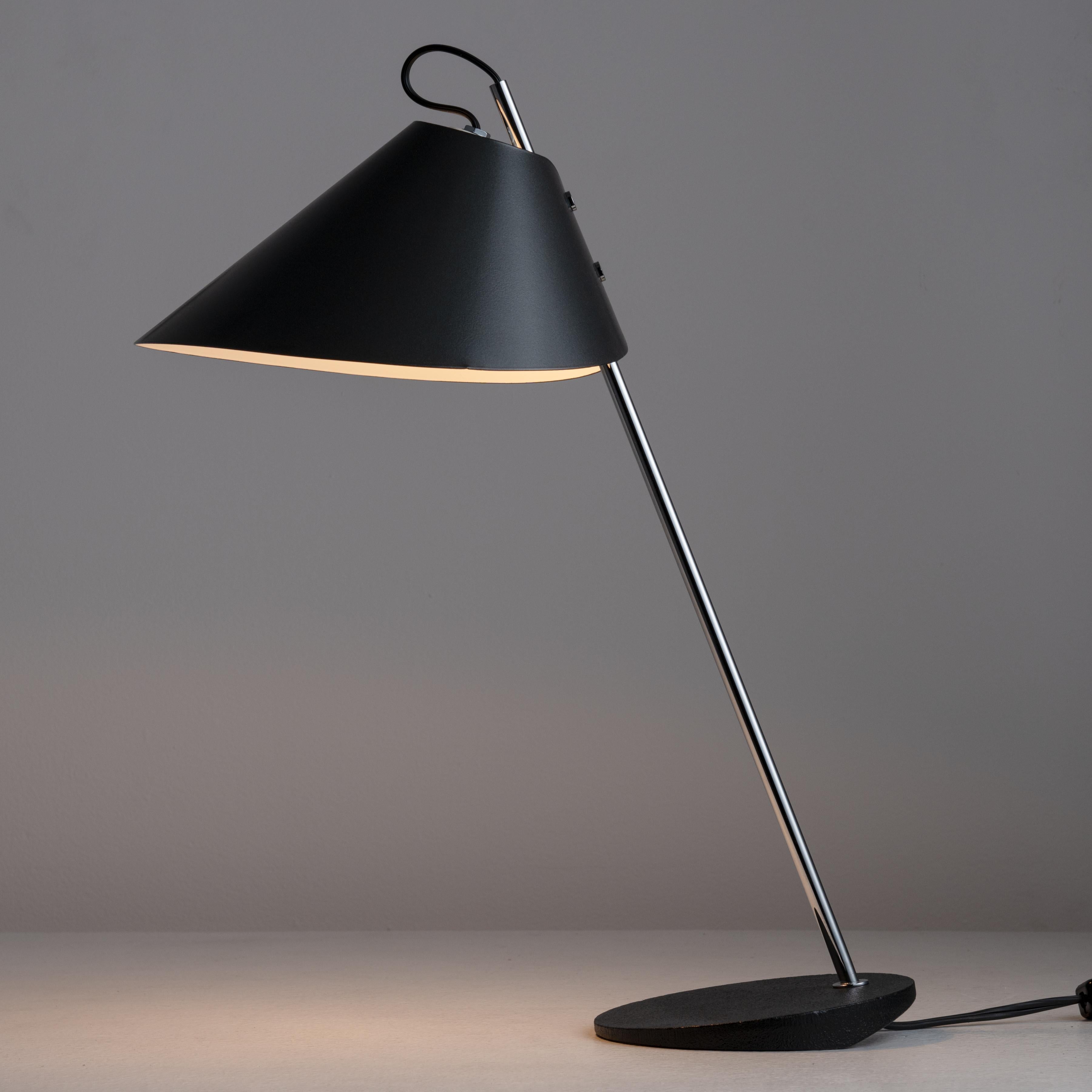 LTA2 'Base Ghisa' Table Lamp by Luigi Caccia Dominioni for Azucena. 21st Century Re-edition by Azucena. Chrome stem on a weighted enameled base. A metal enameled shade provides the diffuson. Adjustable neck height. E14 socket type, adapted for the