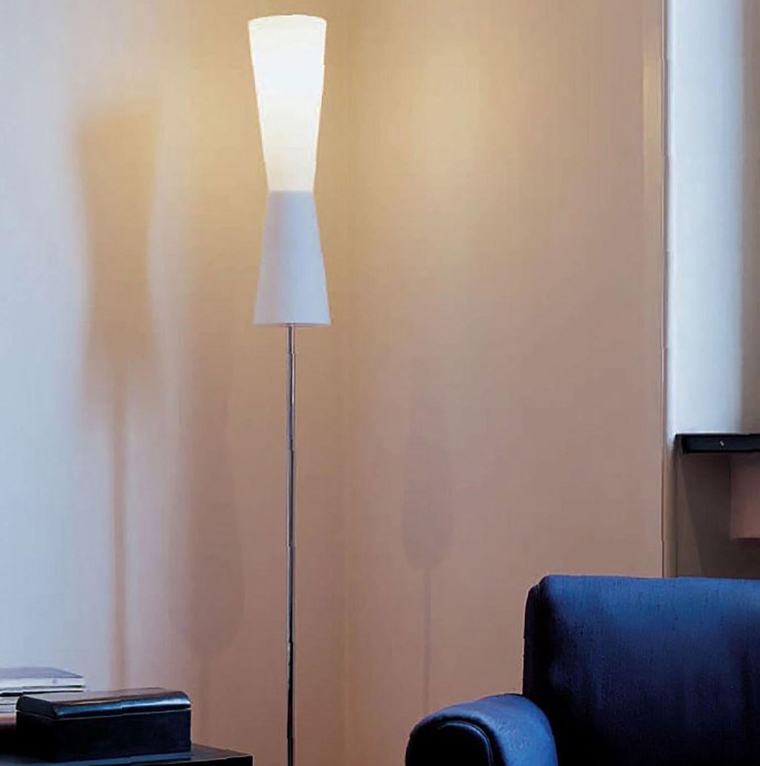 Lu-Lu floor lamp by Stefano Casciani for Oluce. This elegant floor lamp has a Murano glass diffuser with a brushed metal base, designed by Stefano Casciani. The design is simple and primitive, filtered perhaps, through cubist suggestion. The stand