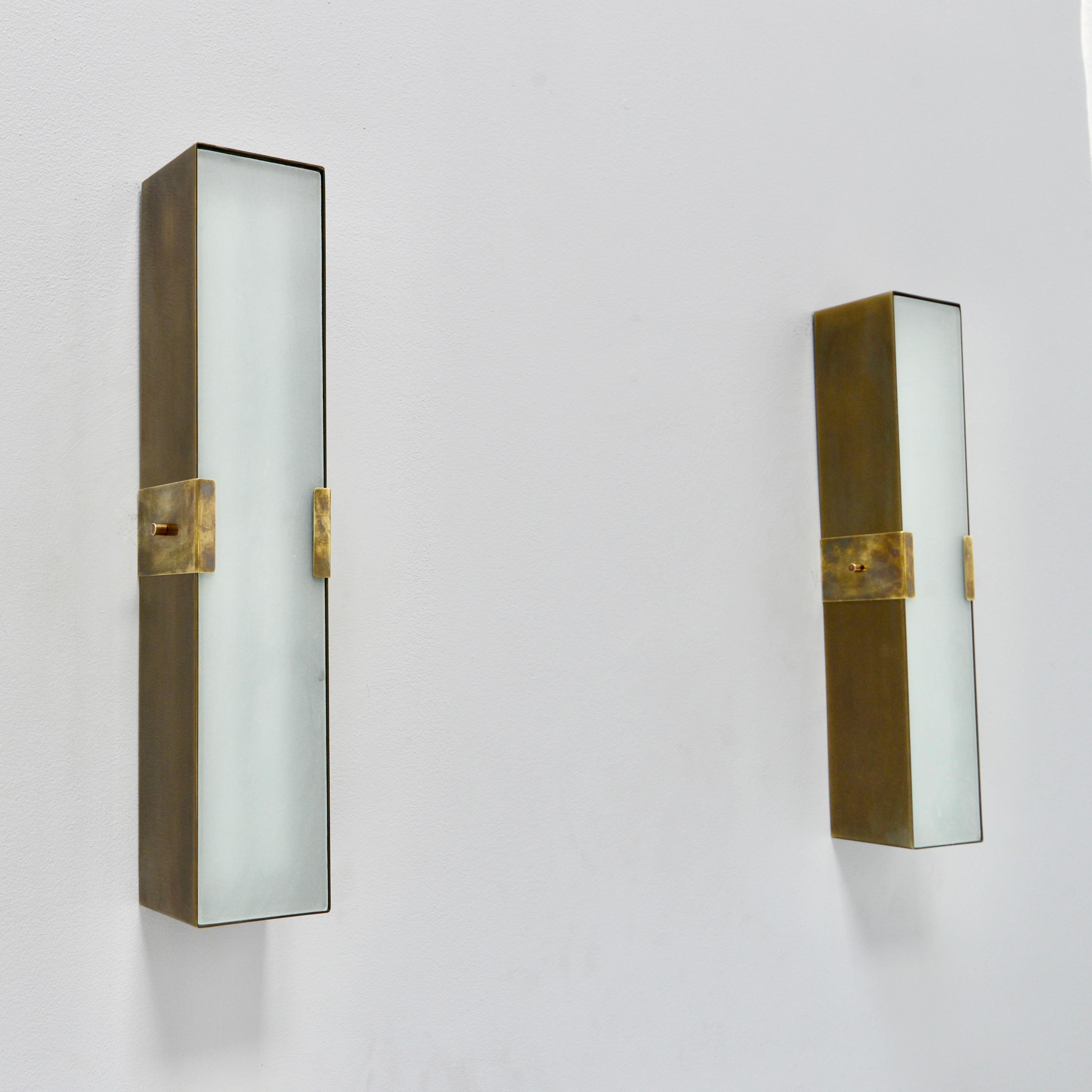 Part of Lumfardo Luminaries contemporary collection, the LUsquare RT BR Sconce is a narrower and longer expression of our LU Square Sconce in brass. Classic mid century modern design made to order. Crafted from patinated brass steel and frosted