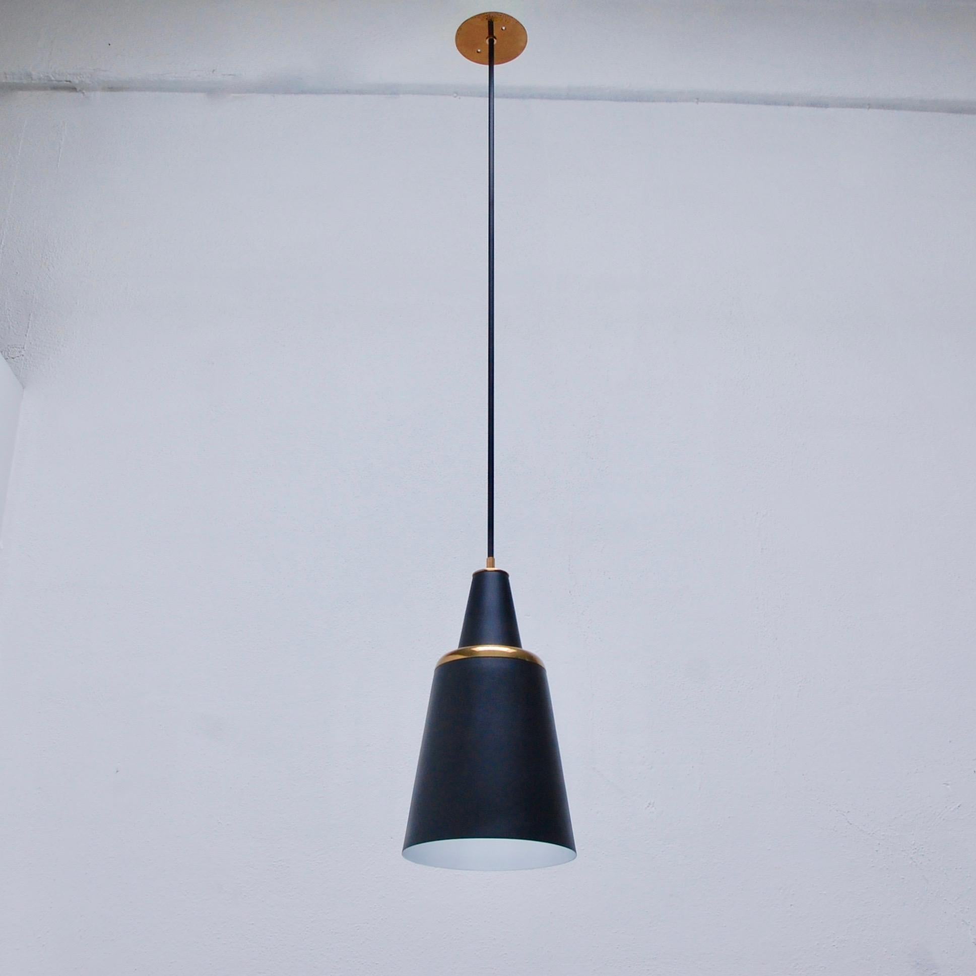 Description: Modern LUbell pendant by Lumfardo Luminaires. Made to order. Brass and painted aluminum finish. Custom finish and OAD can be made upon request. Single E26 medium based light socket per shade. Priced individually. Multiples may be